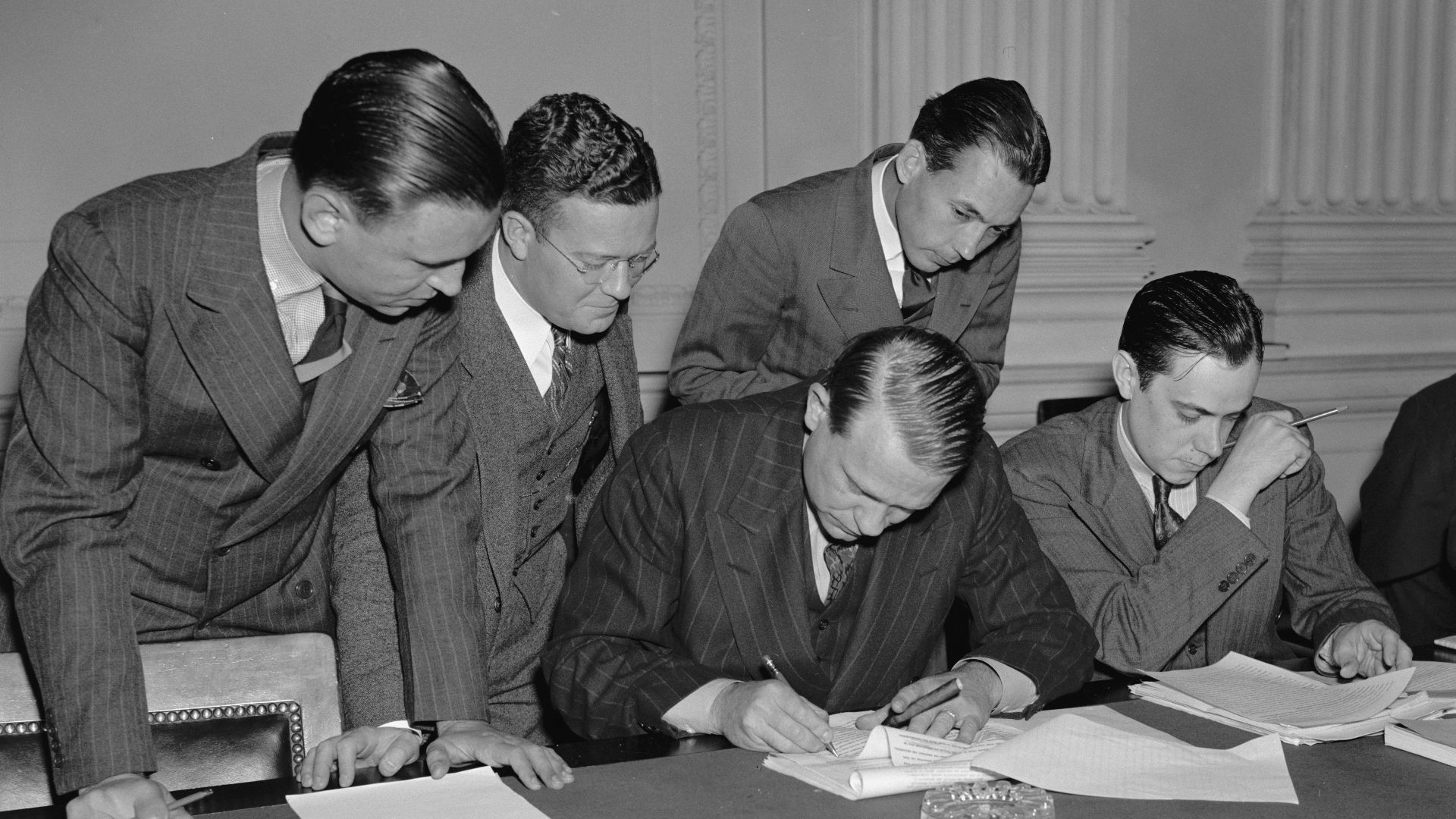 While newsmen take notes, Chairman Dies of House Committee investigating Un-American activities, proofs & reads his statement replying to Pres. Roosevelt's attack on the Committee, Oct. 26, 1938