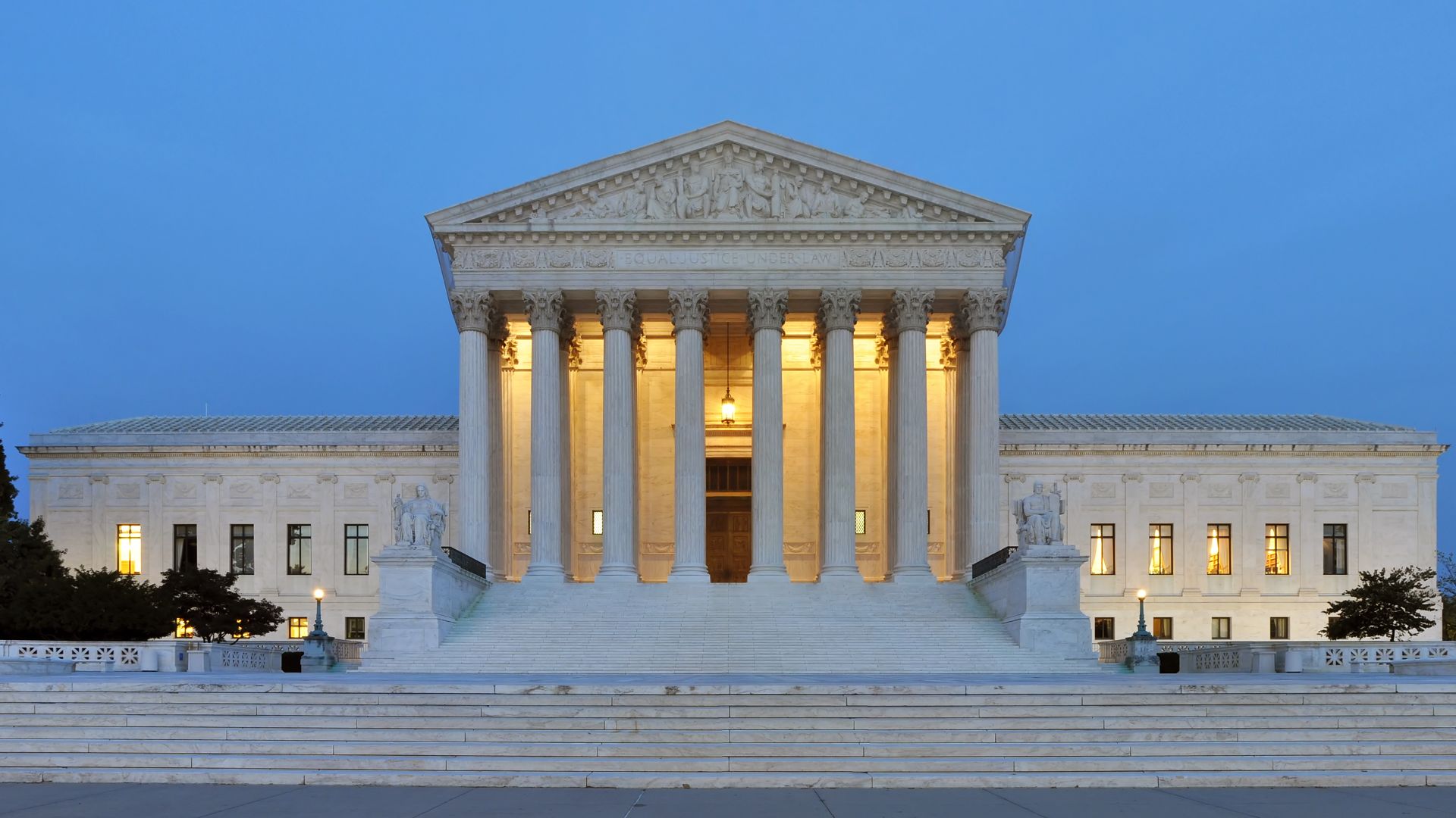 Panorama of the west facade of United States Supreme Court Building at dusk in Washington, D.C., United States of America.