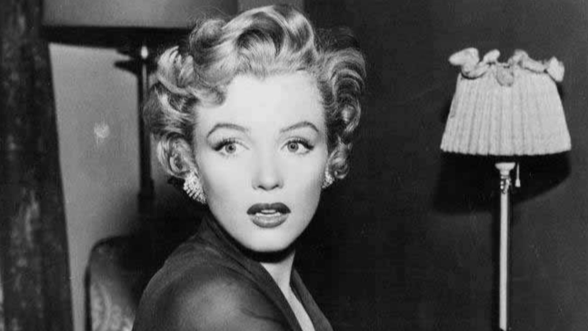 Monroe in Don't Bother to Knock (1952) from the July 1953 issue of Modern Screen.
Note this is a larger, better quality copy of the photo seen on Modern Screen page 33.
A renewal search was done at copyright.gov using the title Modern Screen.  There were no listings for the publication; there's no evidence of continued copyright on the magazine.