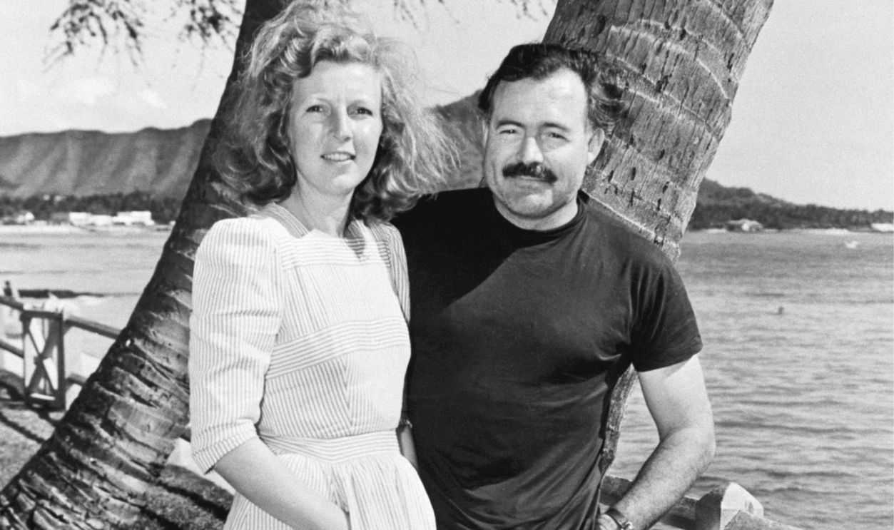Getty Images - 514866584 - Mr. and Mrs. Hemingway (she is Martha Gellhorn) on beach at Waikiki.