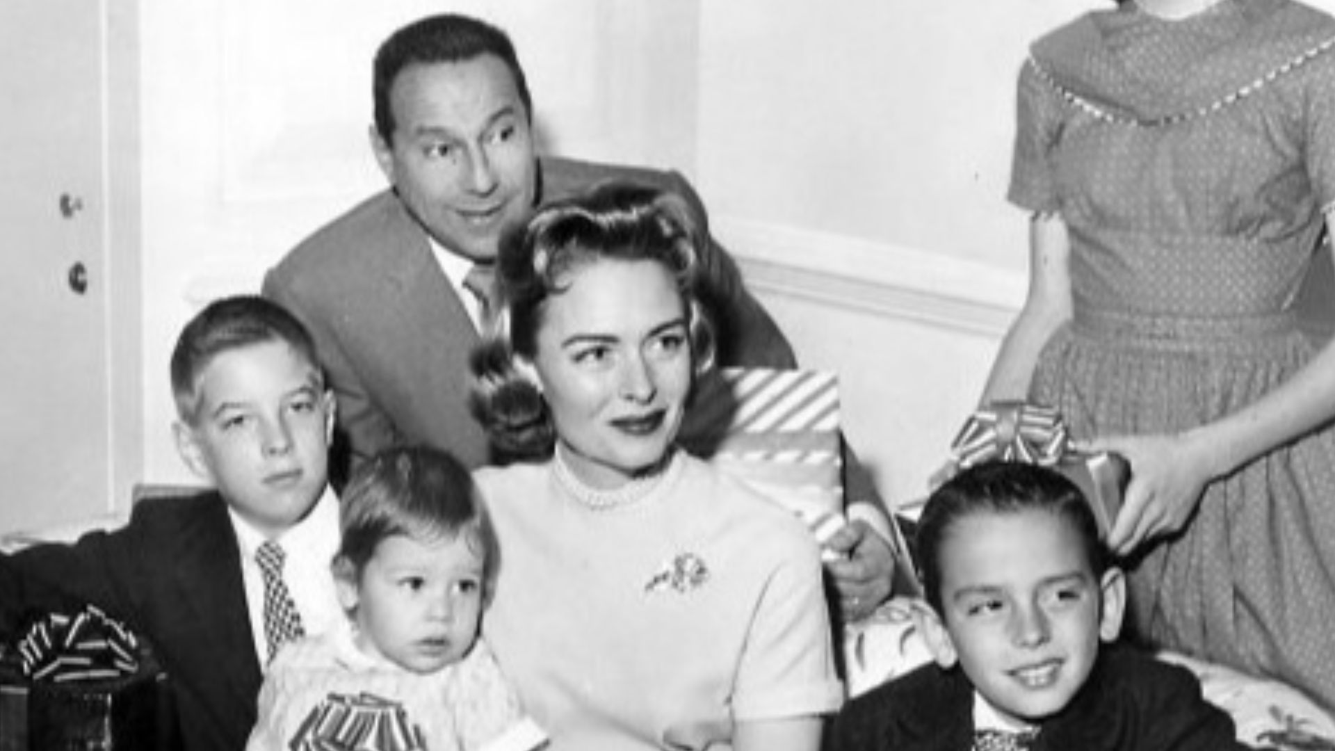 Publicity photo of actress Donna Reed and her family in 1959.  In back are Tony Owen (Reed's husband at that time) and daughter Penny Jane.  Seated with Reed from left are son, Tony, Jr., daughter Mary and son, Tim.