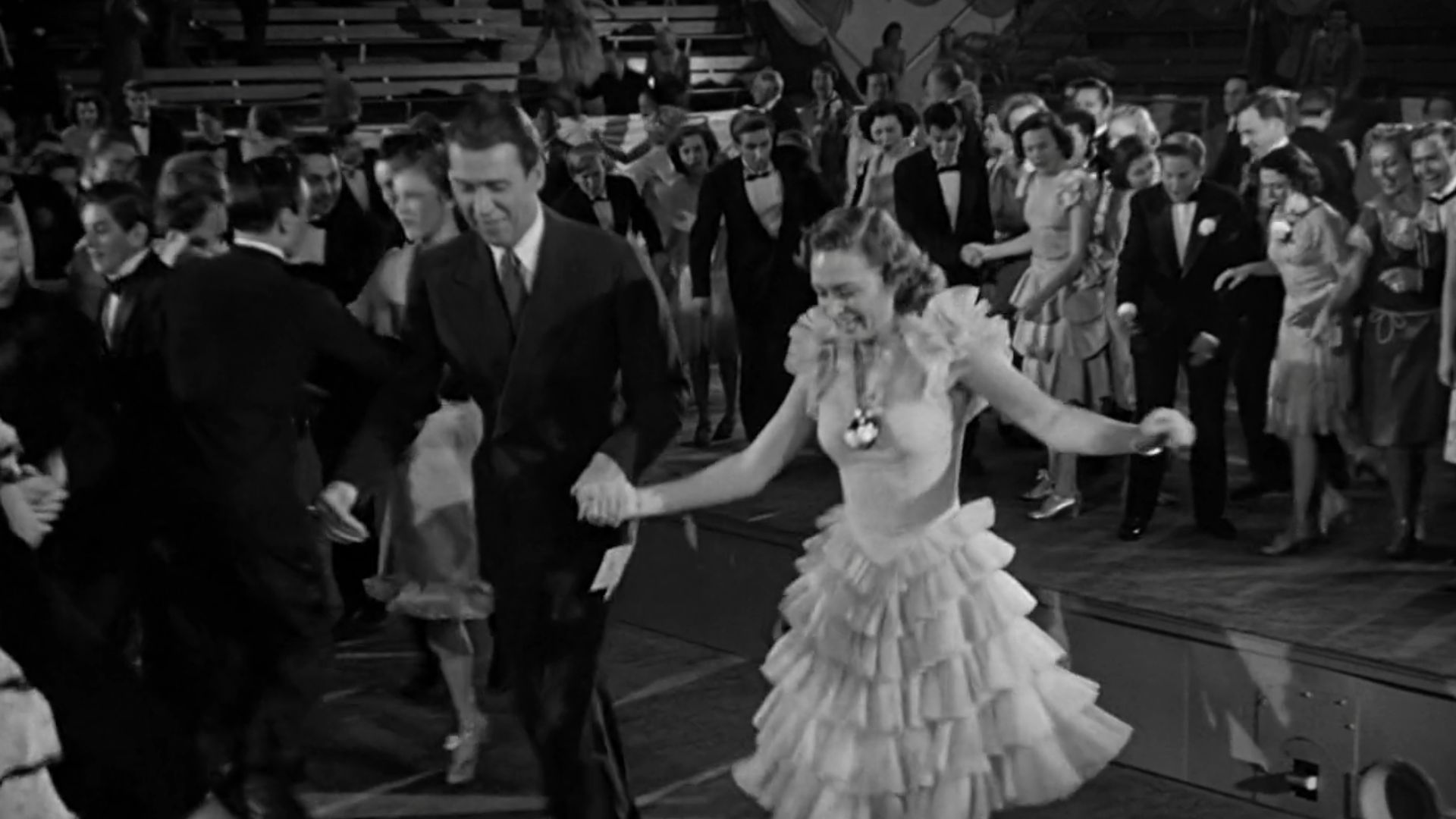 James Stewart and Donna Reed in the American film It's a Wonderful Life (1946).  The film lapsed into the public domain in the United States due to the failure of National Telefilm Associates, the last copyright owner, to renew.  See film article for details.