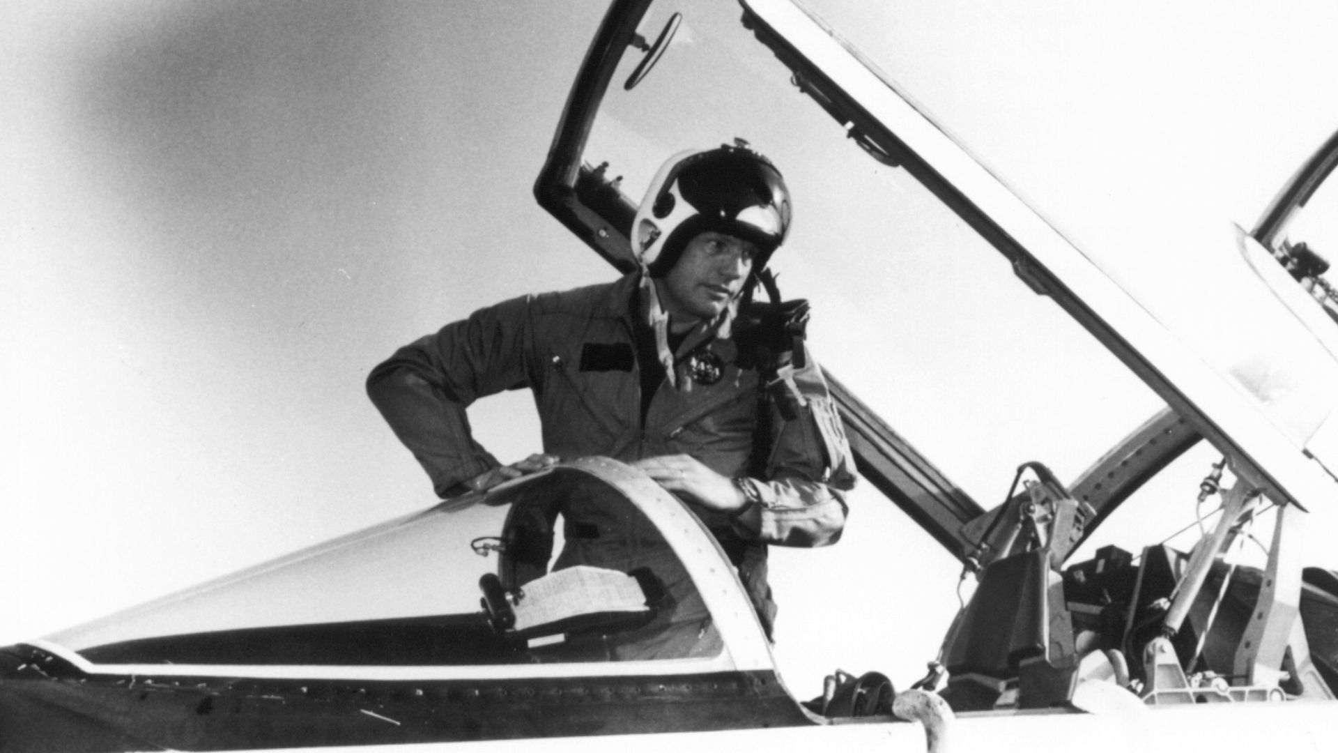 Neil Armstrong climbing out of the cockpit of a T-38, after arrival at Patrick Air Force Base. Photo filed 17 June 1969.