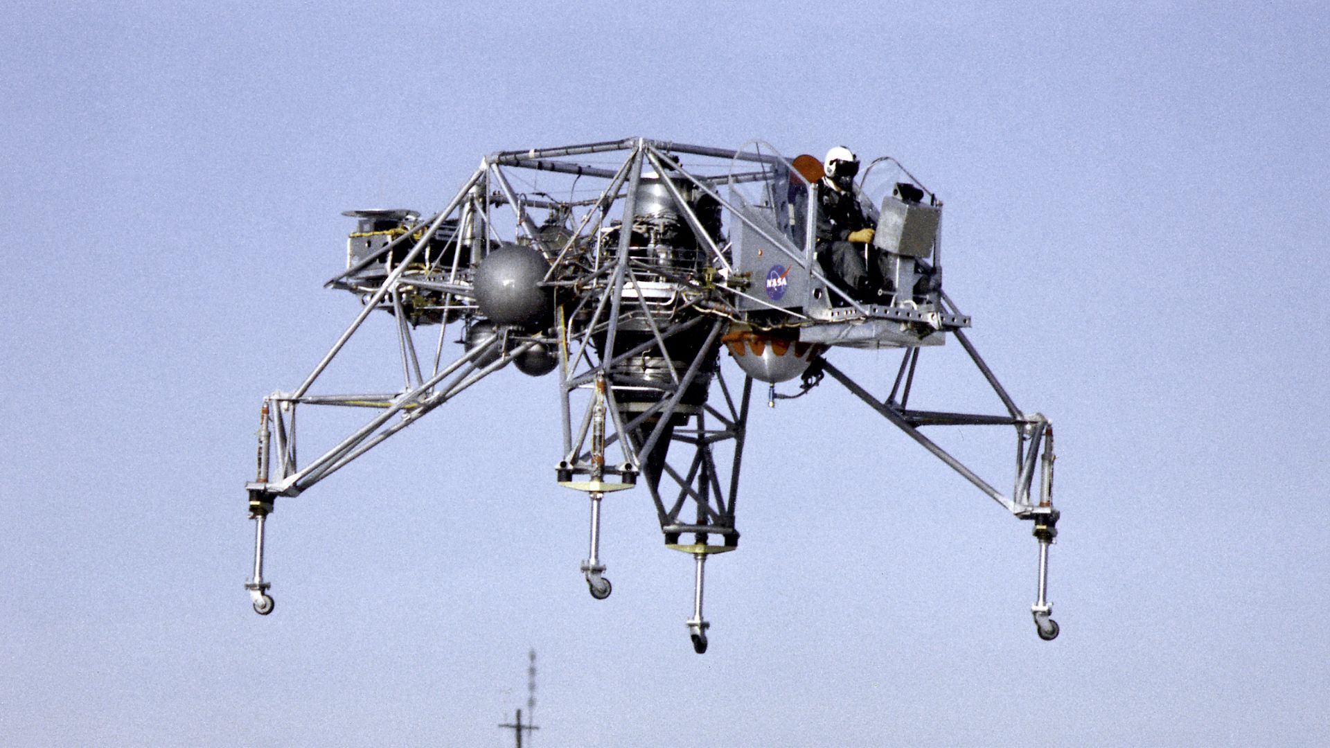 This 1964 NASA Flight Reserch Center photograph shows the Lunar Landing Research Vehicle (LLRV) Number 1 in flight at the South Base of Edwards Air Force Base. When Apollo planning was underway in 1960, NASA was looking for a simulator to profile the descent to the moon's surface. Three concepts emerged:  an electronic simulator, a tethered device, and the ambitious Dryden contribution, a free-flying  vehicle. All three became serious projects, but eventually the NASA Flight Research Center's (FRC) Landing Research Vehicle became the most important.