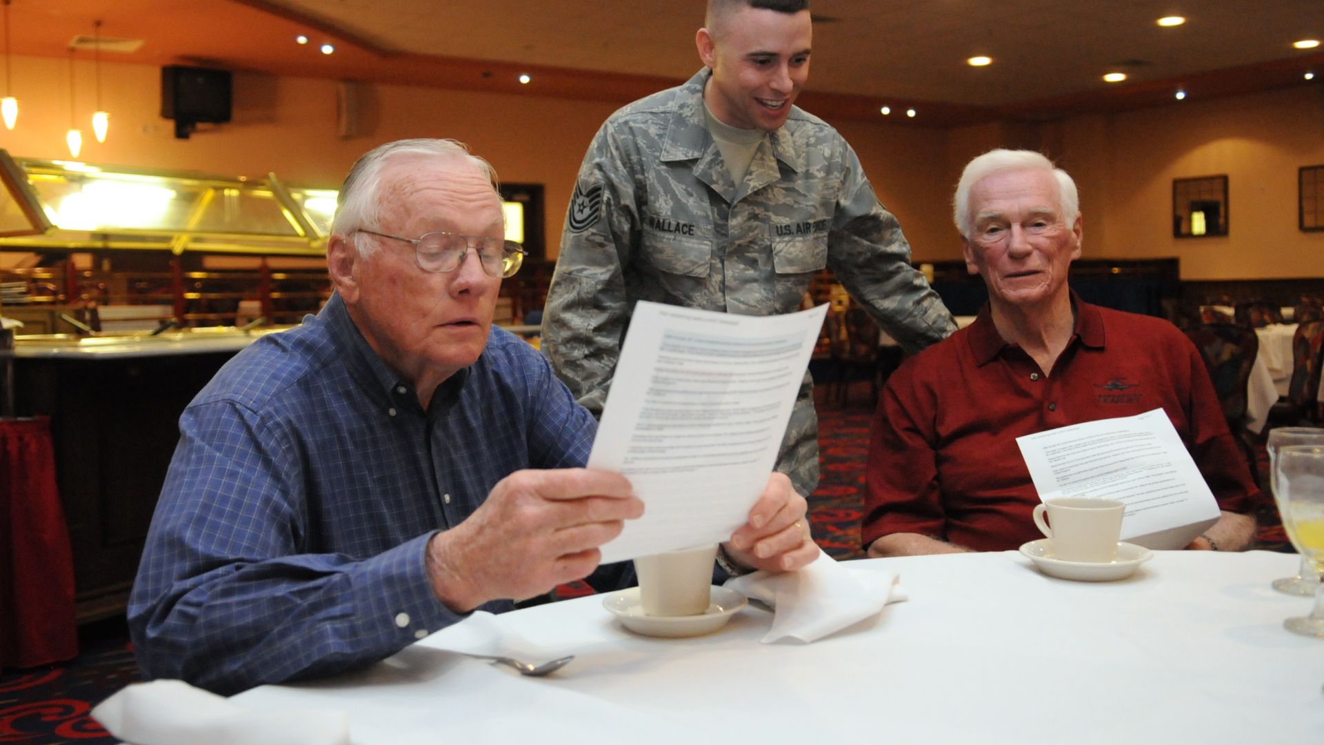 Stepping out of their space suits and acting as public affairs editors, Neil Armstrong (left) and Gene Cernan read the news story Tech. Sgt. Kevin Wallace (center) wrote about their participation in a March 11 “Legends of Aerospace: The Impossible Is Possible” tour at RAF Mildenhall’s Galaxy Club. In addition to the first and last astronauts to walk on the moon, the tour featured: Former “Good Morning America” host David Hartman, Apollo 13 commander Jim Lovell, last Air Force pilot ace Steve Ritchie, and SR-71 chief test pilot Bob Gilliland.
Unit: 100th Air Refueling Wing Public Affairs
DVIDS Tags: Jim Lovell; England; NASA; Good morning America; RAF Mildenhall; Apollo 13; Neil Armstrong; Bob Gilliland; Gene Cernan; Steve Ritchie; David Hartman; Kevin Wallace; Sgt. Kevin Wallace