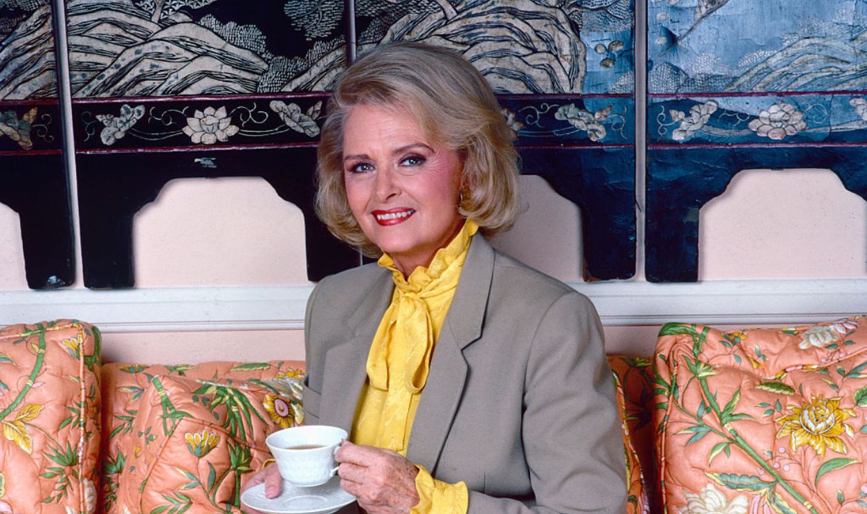 Portrait of American actor Donna Reed (1921 - 1986) as she holds a teacup & saucer, Los Angeles, California, 1985. 