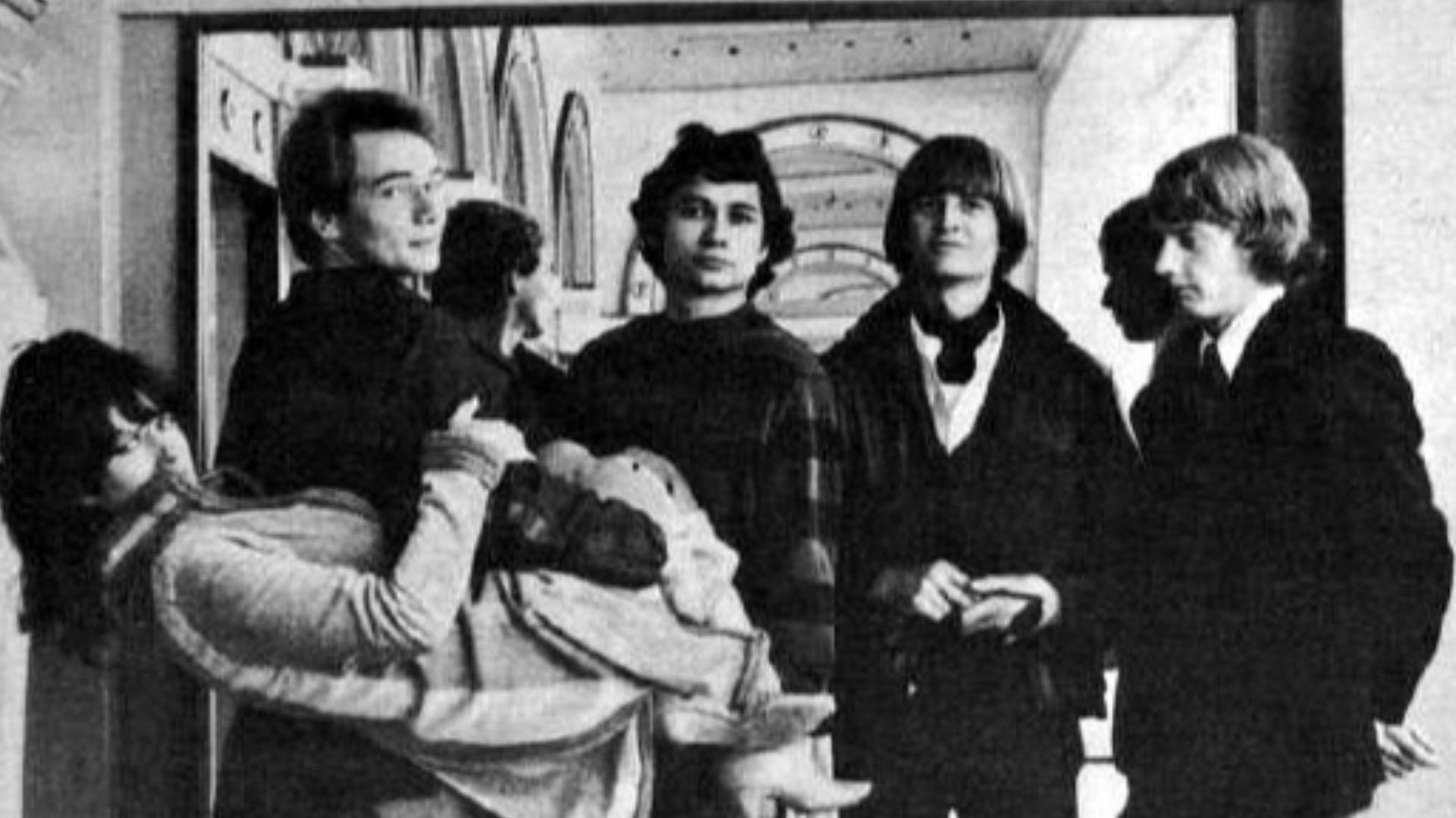 Photo of the music group The Great Society. From left-Grace Slick, Jerry Slick (carrying Grace), David Miner, Bard Dupont, and Darby Slick. Grace Slick began her musical career with the band. Her ex-husband, Jerry, and former brother-in-law, Darby, were also members. Darby Slick is the author of