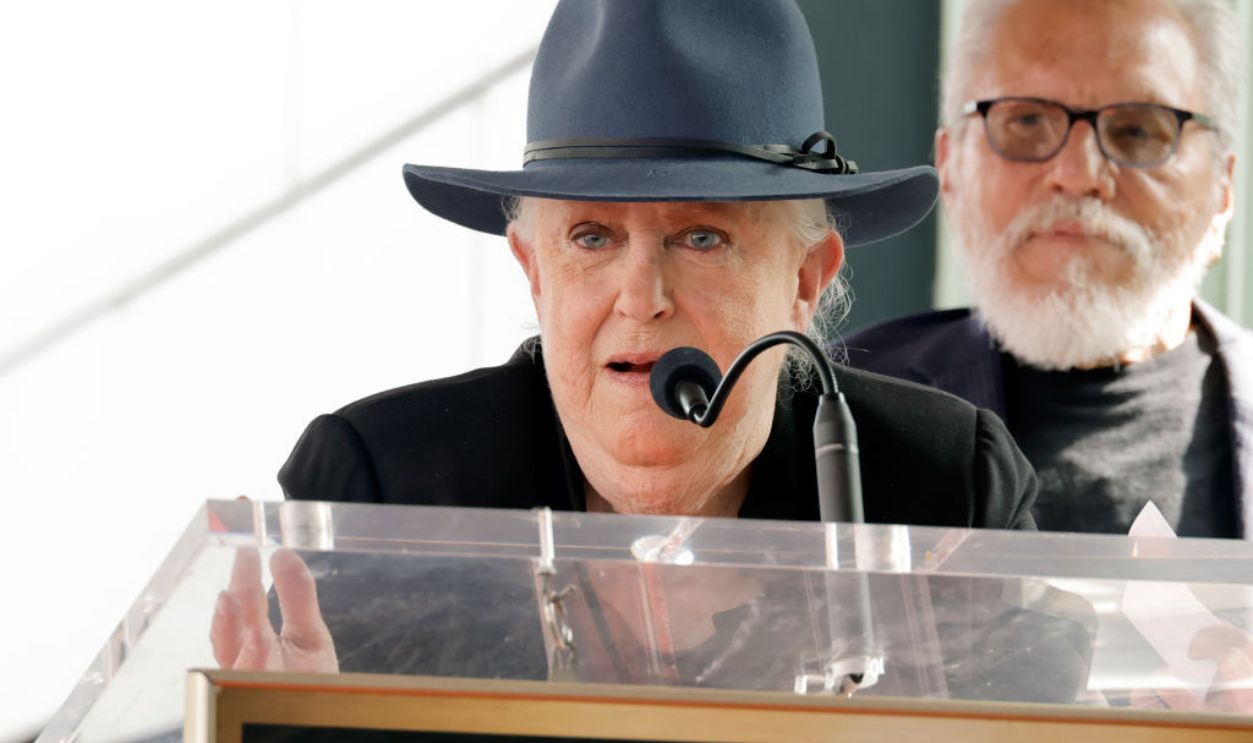LOS ANGELES, CALIFORNIA - OCTOBER 13: (L-R) Grace Slick and Jorma Kaukonen speak onstage during the star ceremony for Jefferson Airplane at the Hollywood Walk of Fame on October 13, 2022 in Los Angeles, California.