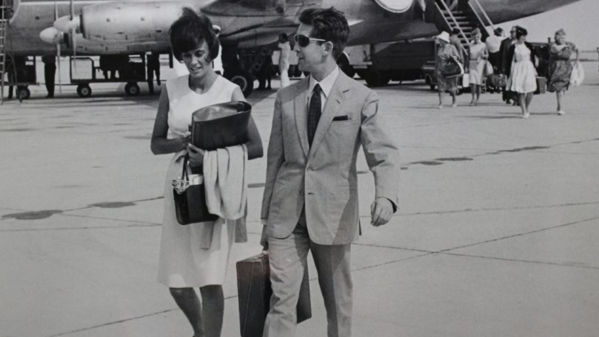 Alitalia Douglas DC-6 and Franco Cristaldi with his secretary Paola Quagliero, a roman born ca 1940.[1] So, this is estimated to be in 1960.