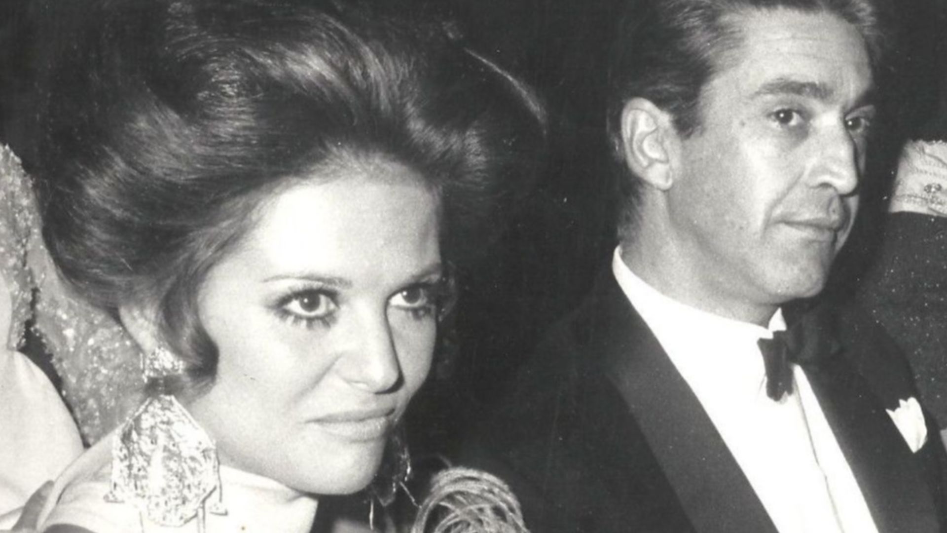 Claudio Cardinale and Franco Cristaldo.  He was a film producer born in 1924, and her mentor since the late 1950s. She was born in 1938. They were living together (maybe married) 1966 to 1975. So this may be around 1965. Just a guess.