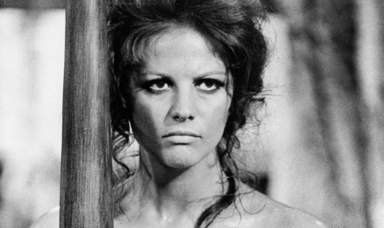  Claudia Cardinale with only sheets to cover her in a scene from the film 'Once Upon A Time In The West', 1968.  