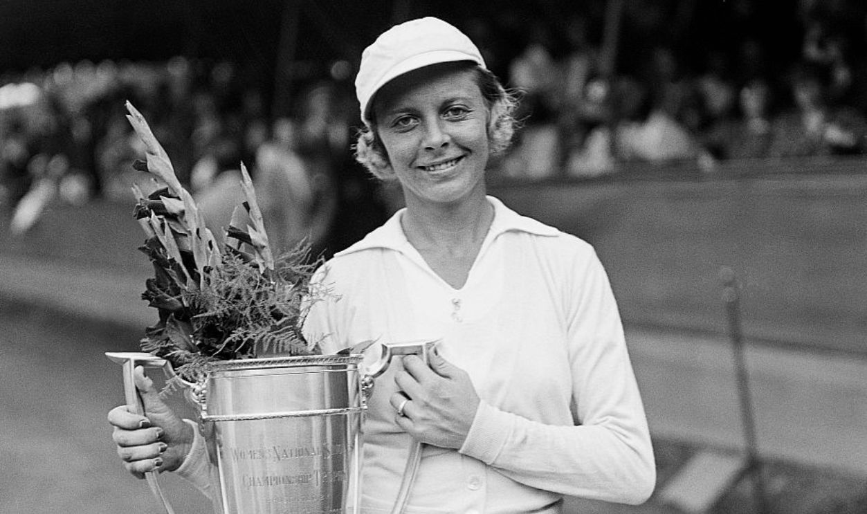 (Original Caption) 9/12/1936-Forrest Hills, NY- Miss Alice Marble of San Francisco, is pictured with the cup emblematic of the Woman's National Singles Championship, following her victory over Helen Jacobs, last year's champion at the West Side Tennis Club, Forrest Hills, L.I., Sept. 12. 