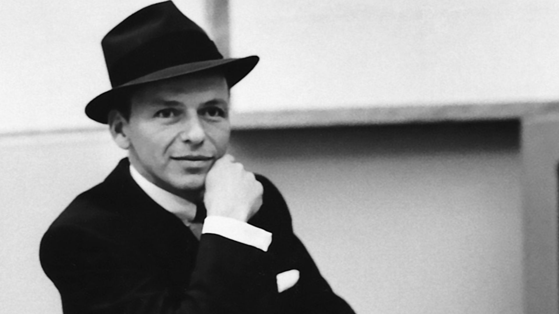 Portrait of Frank Sinatra in the recording studio, October 1957. Capitol Records released the publicity photo to the press to promote Sinatra's appearance in the film Pal Joey, which premiered later that month, and an unnamed upcoming album on Capitol, presumably Come Fly with Me (recorded that month and released January 1958). According to a blurb attached to the photo's backside, Sinatra