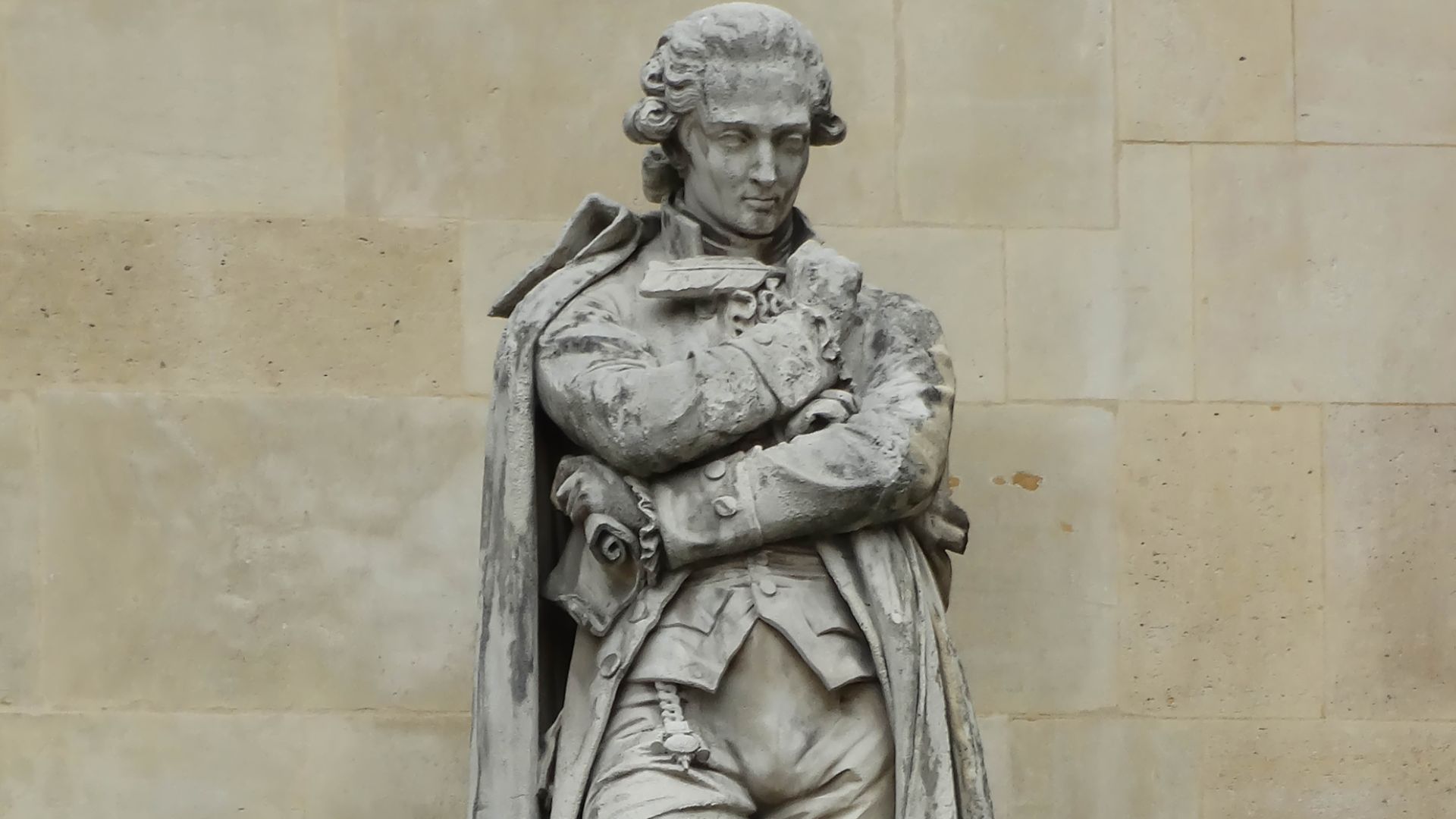 Created by Jacques-Leonard Maillet this statue is of Antoine-Laurent de Lavoisier, an historical chemist, found on the Rotonde de Beauvais facade of the Louvre.