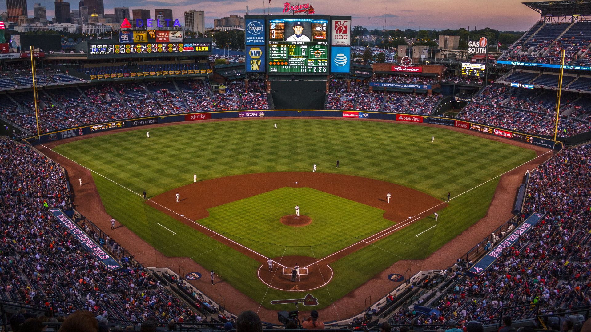 players and fans on baseball stadium