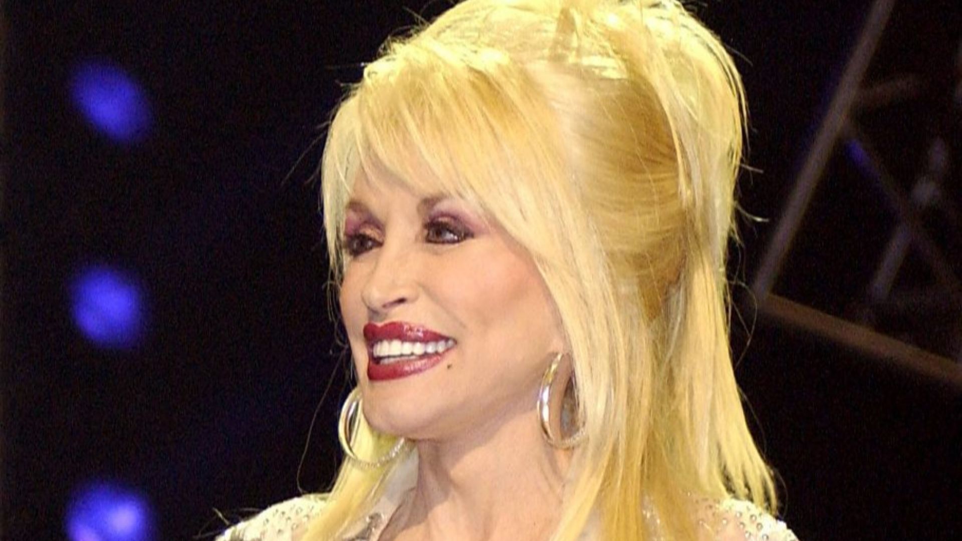 Secretary of Defense Donald H. Rumsfeld joins country music legend Dolly Parton on stage at the Grand Ole Opry during a live broadcast in Nashville, Tenn., on April 23, 2005.