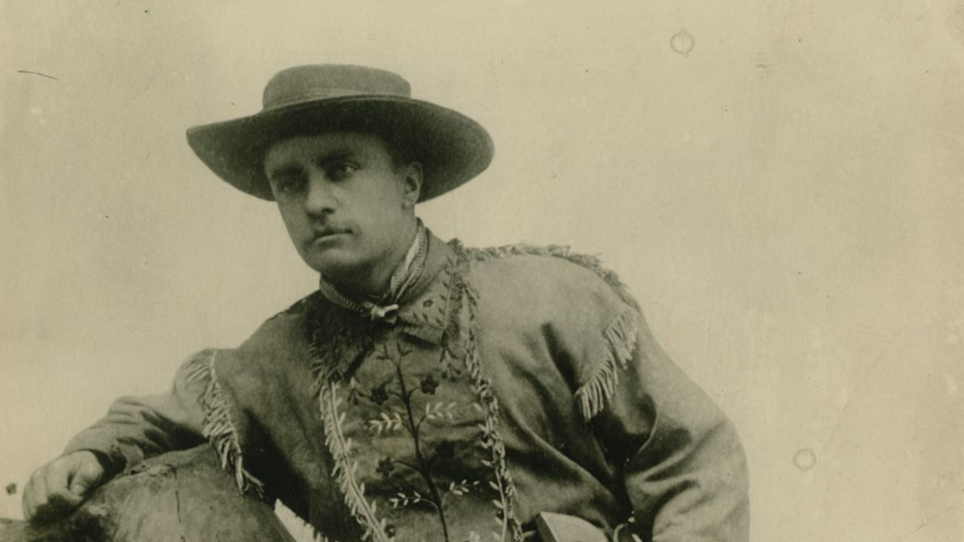 Theodore Roosevelt, studio photo in Cowboy attire with revolver, 1883