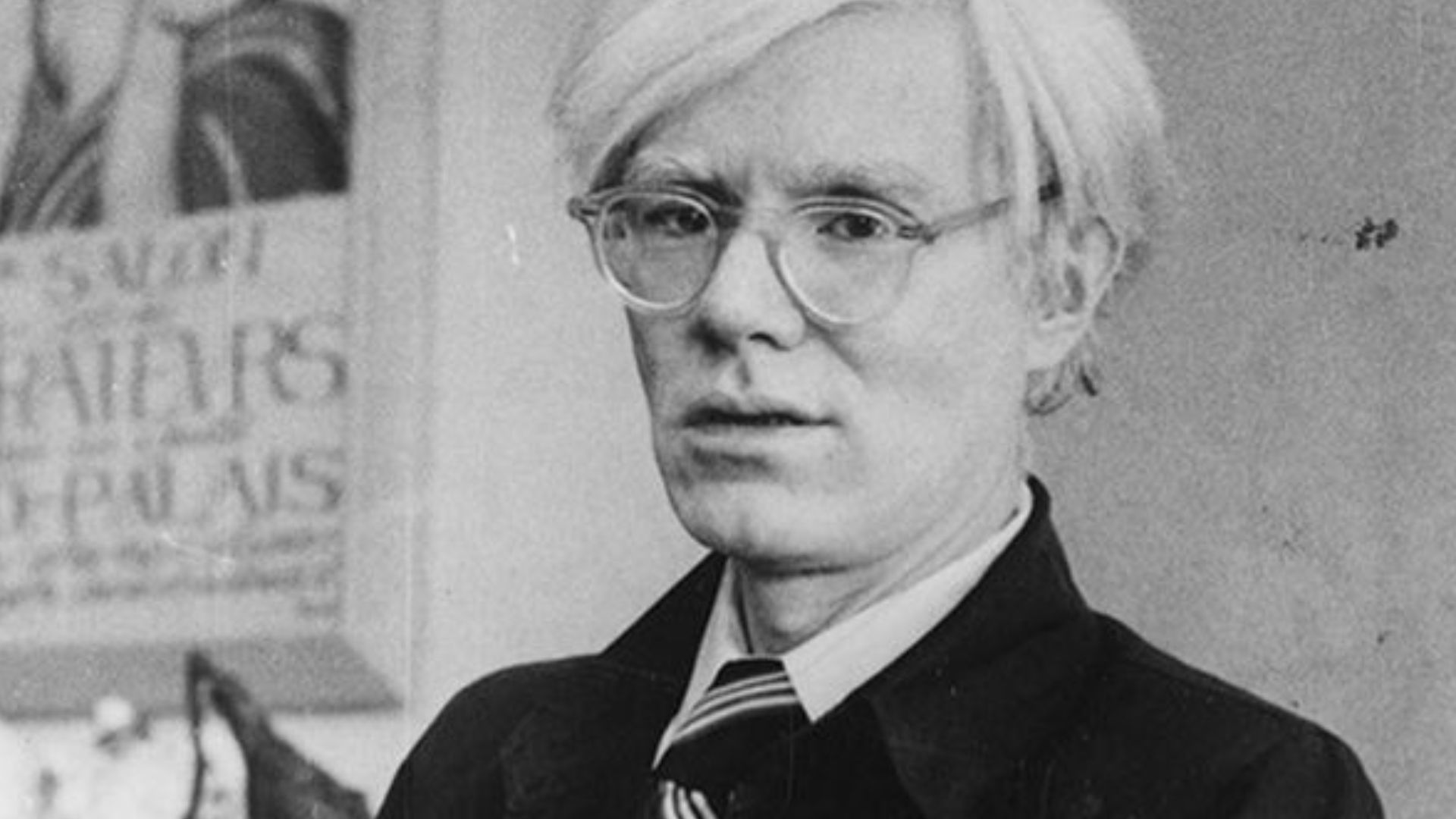 Andy Warhol and his dachshund Archie at his New York studio, the Factory