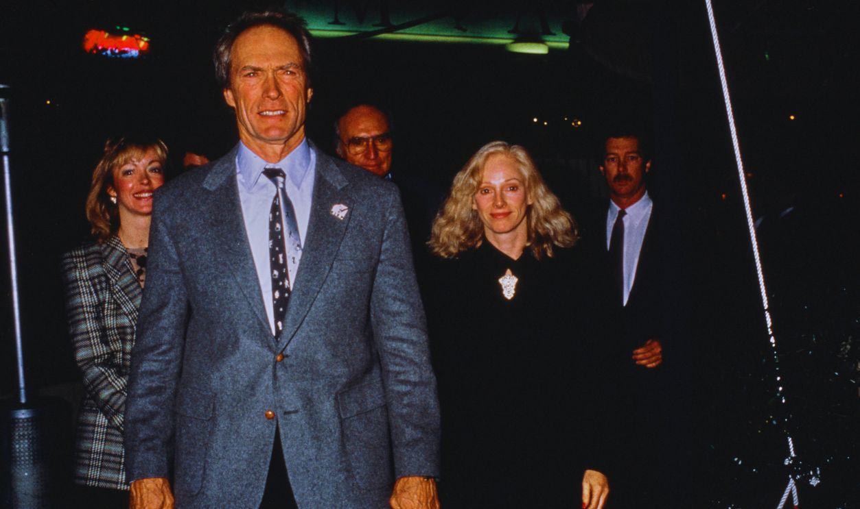   Gettyimages - 2187460450, Clint Eastwood And Sondra Locke American actor Clint Eastwood and his partner, actress Sondra Locke, attending the premiere of 'Twins' at the Century Plaza Hotel in Los Angeles, California, December 8th 1988. 