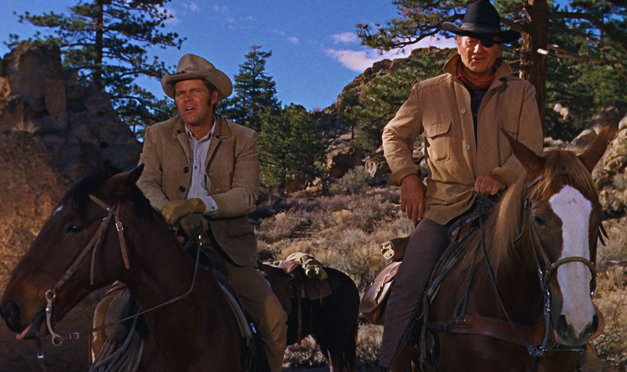Gettyimages - 1024996796, True Grit 1969 Actors John Wayne (right) as Rooster Cogburn and Glen Campbell as La Boeuf in a scene from the western 'True Grit', 1969. 