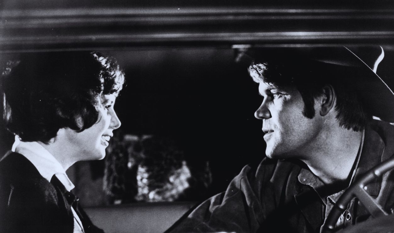 Gettyimages - 145665238, Kim Darby And Glen Campbell In 'Norwood' Kim Darby and Glen Campbell sitting in a automobile talking with one another in a scene from the film 'Norwood', 1969. 
