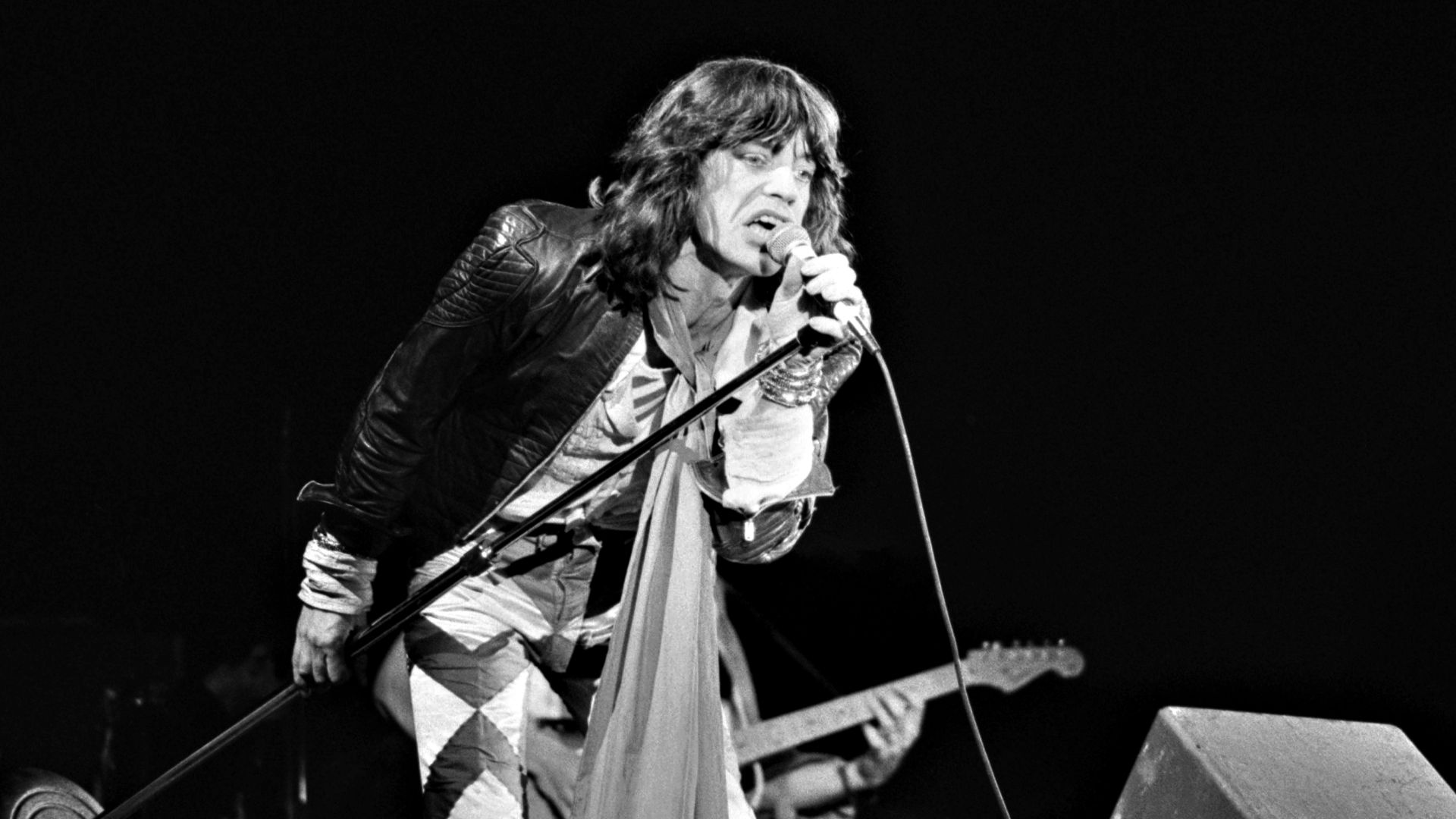 Mick Jagger during a Rolling Stones concert in Zuiderpark in The Hague on May 29, 1976. This is a cropped and retouched (adjustments of colour, sharpened, removed some spots) version of the original image from the Nationaal Archief.