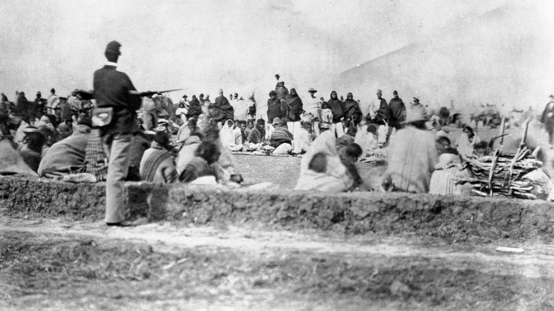 Navajo Indian captives under guard, Fort Sumner, New Mexico, ca. 1864–1868. Photograph by the United States Army Signal Corps, courtesy of Palace of the Governors Photo Archives (NMHM/DCA), 028534