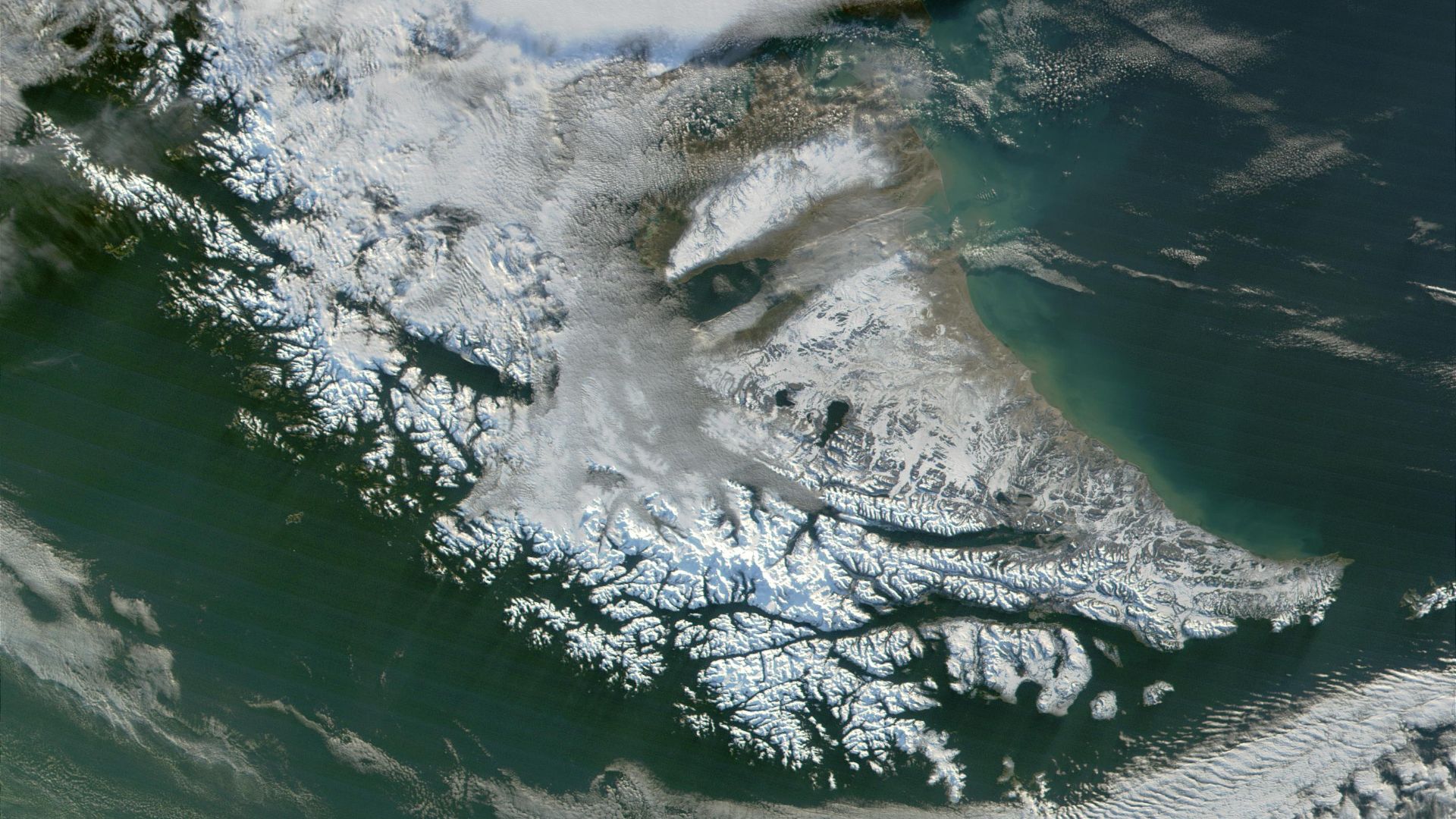 Satellite image of Tierra del Fuego. Very cloudy and snowy because this picture was taken during the southern hemisphere's autumn.