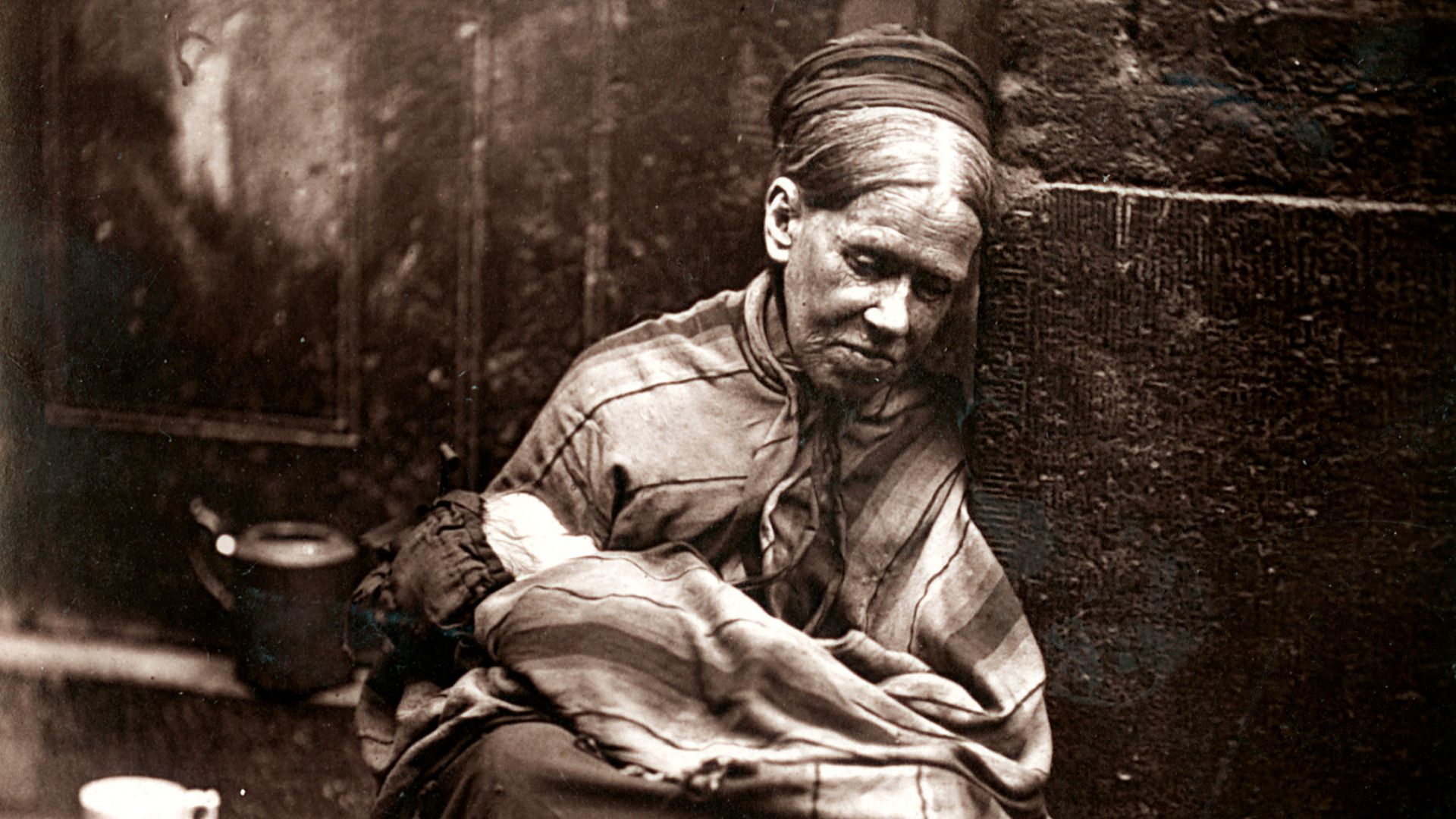 From 'Street Life in London', 1877, by John Thomson and Adolphe Smith:

“But old age, and want of proper food and rest, reduces them to a lethargic condition which can scarcely be preferable to death itself. It will be noticed that they are constantly dozing, and yet are never really asleep. Some of them are unable to lie down for days. They sit on the hard stone step of the workhouse, their heads reclining on the door, and here by old custom they are left undisturbed. Indeed, the policeman of this beat displays, I am told, much commiseration for these poor refugees, and in no way molests them. When it rains, the door offers a little shelter if the wind is in a favourable direction, but as a rule the women are soon drenched, and consequently experience all the tortures of ague and rheumatism in addition to their other ailments. Under such circumstances sound sleep is an unknown luxury, hence that drowsiness from which they are never thoroughly exempt. This peculiarity has earned them the nick-name of