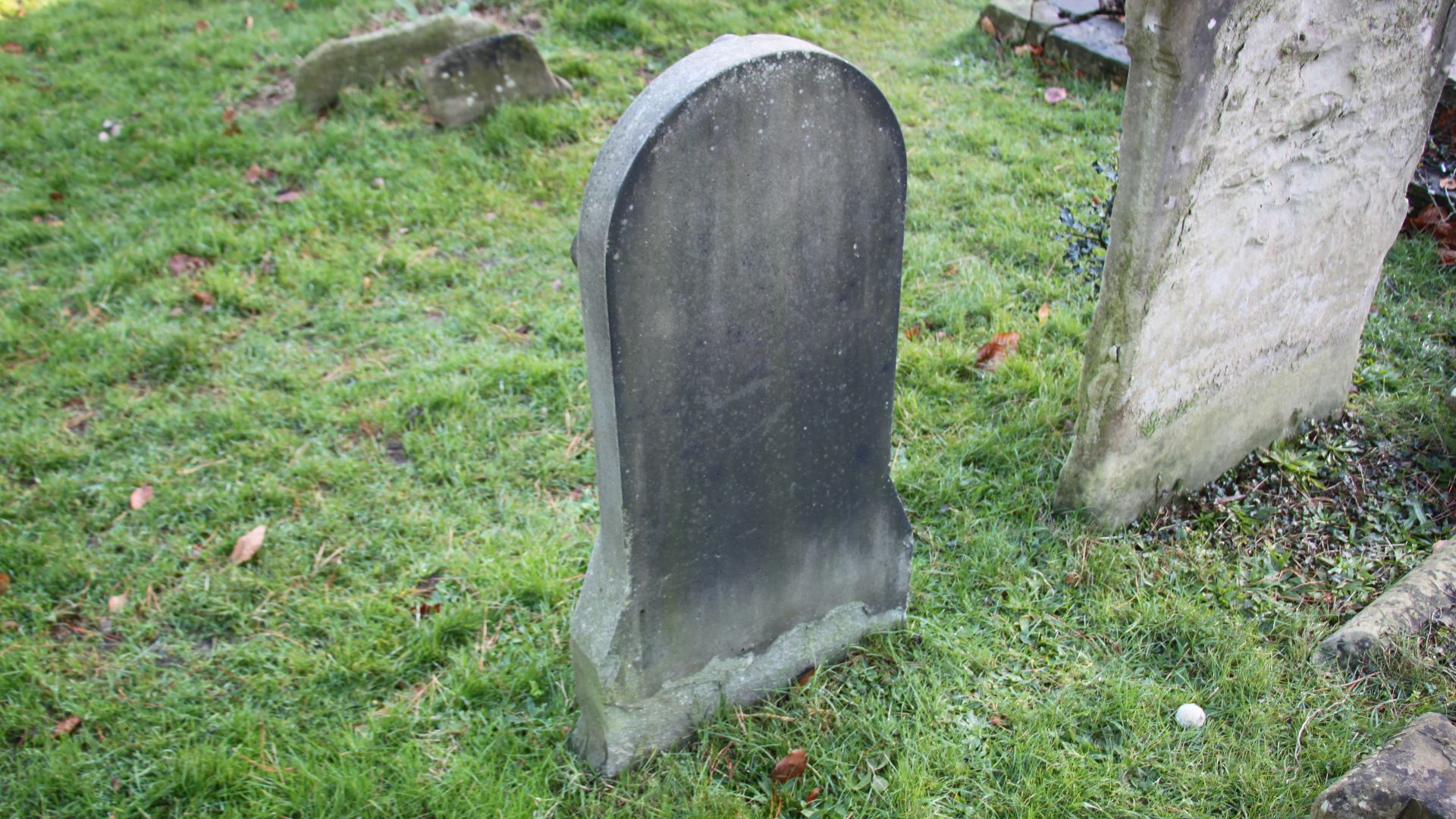 The rear side of Anne Darwin's headstone.