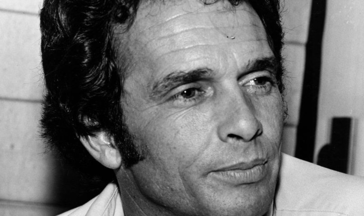 Country musician Merle Haggard poses for a portrait circa 1975.