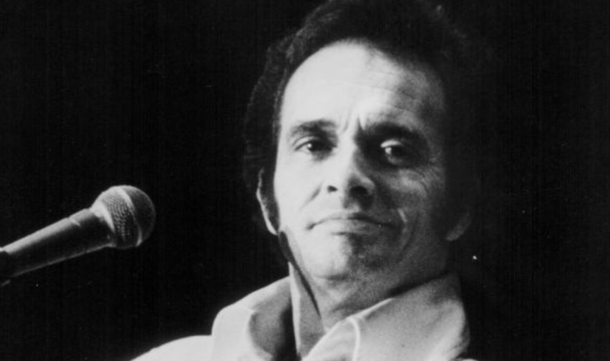 Singer Merle Haggard performing on stage, Sahara Hotel, Las Vegas, April 1976.