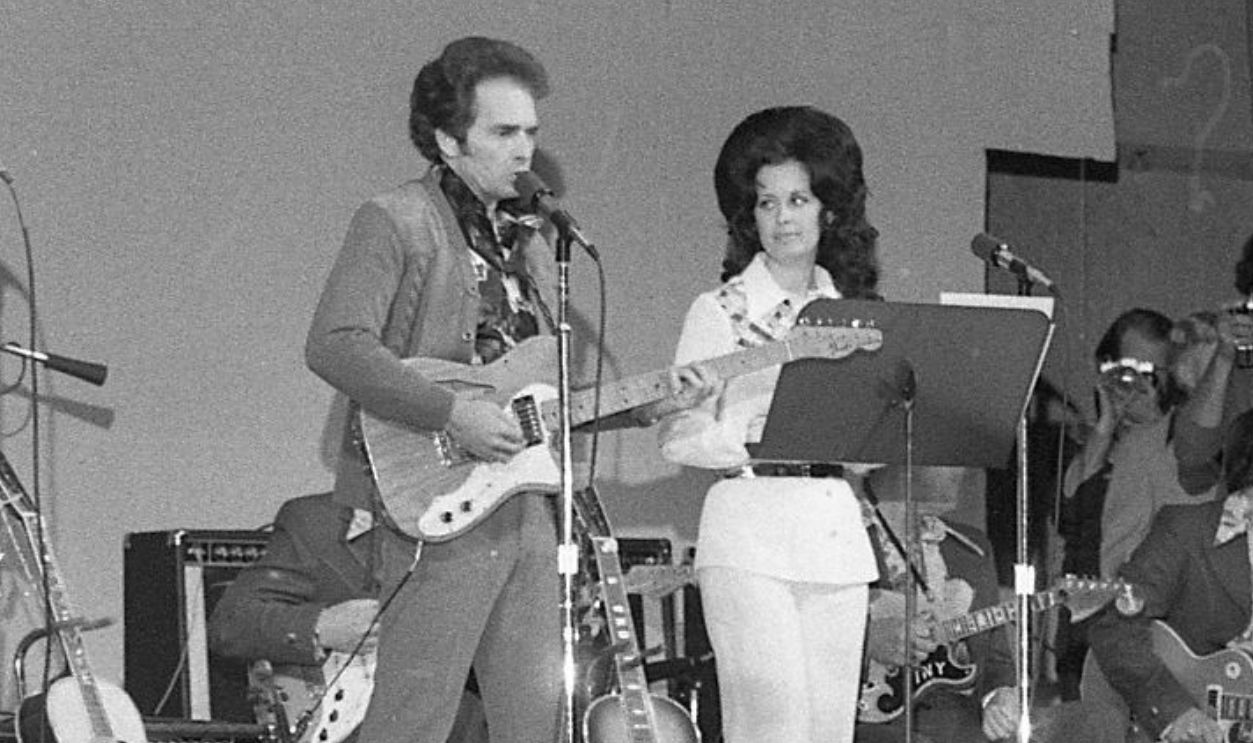 Merle Haggard and Leona Williams play at the annual New Year's Day San Quentin State Prison concert. Jan. 6, 1976.