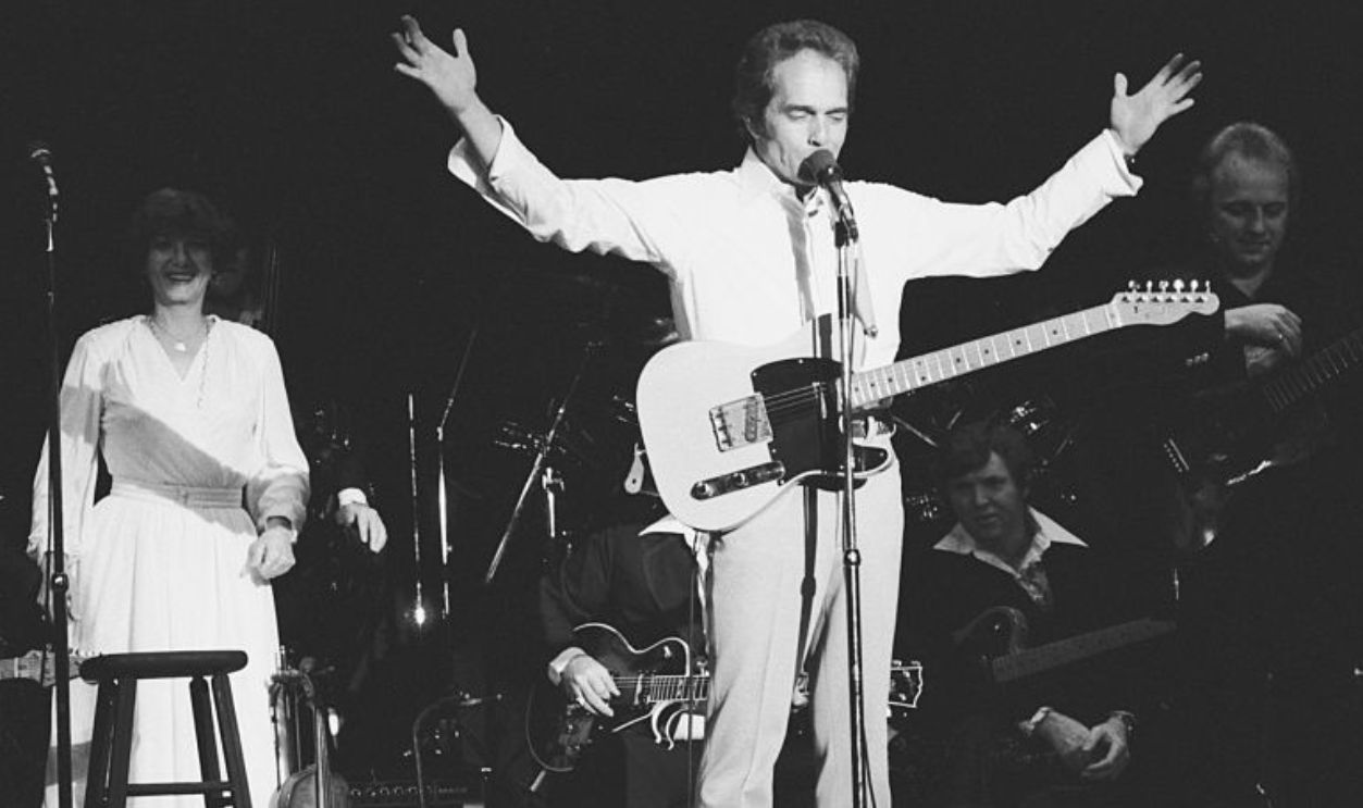 Merle Haggard performs at the Headliner Room at Harrah's in Reno. The back-up singer is Haggard's ex-wife Bonnie Owens.