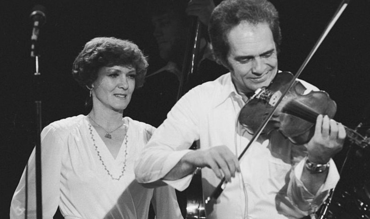 Merle Haggard performs at the Headliner Room at Harrah's in Reno. The back-up singer is Haggard's ex-wife Bonnie Owens. 