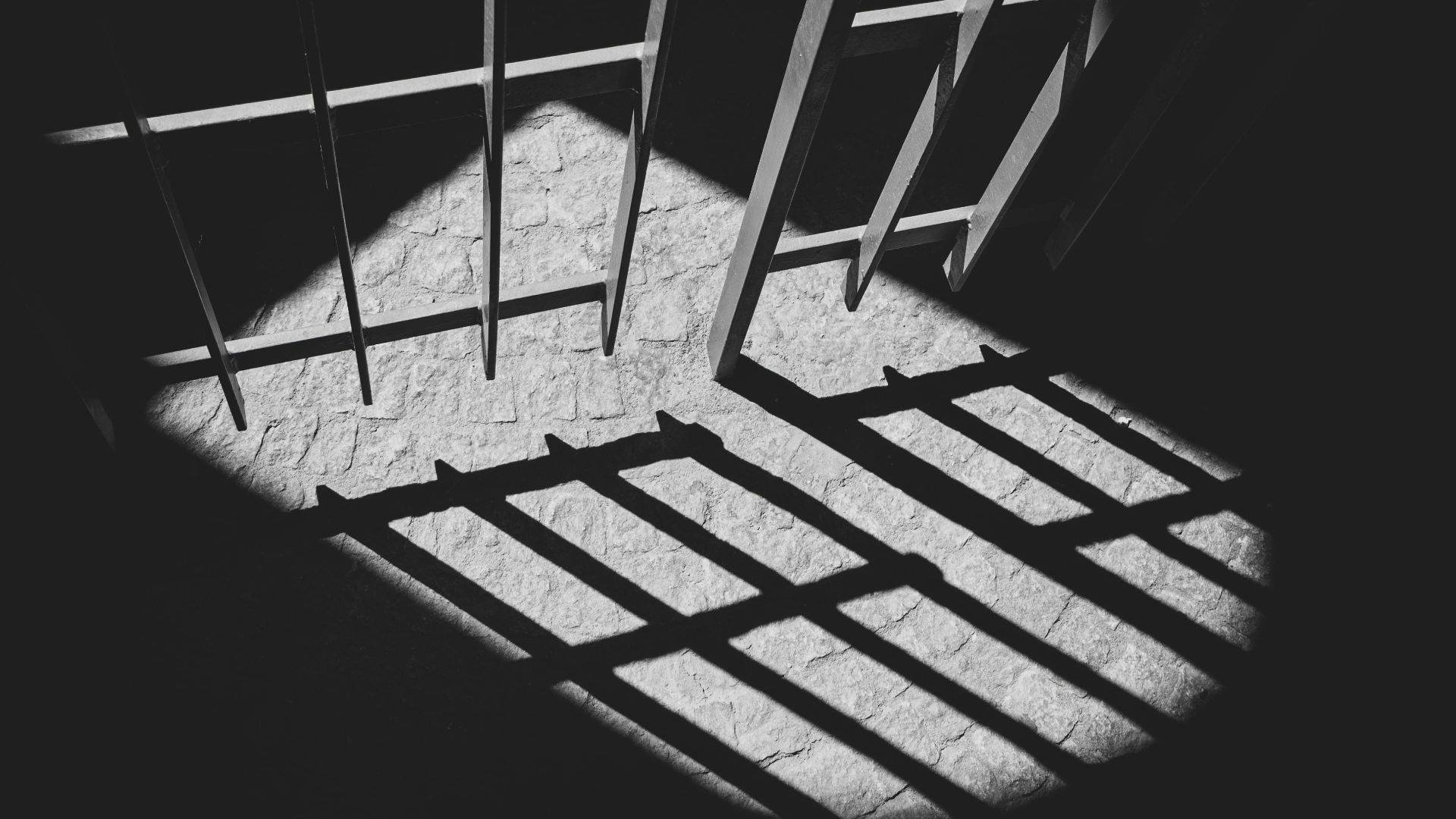 black metal frame in grayscale photography