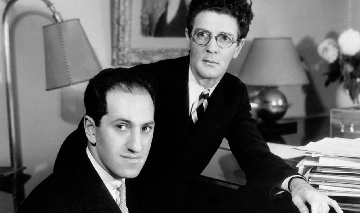 (Original Caption) 1/21/1933-George Gershwin and William Daley are shown at a piano, apparently caught in the act of composing.