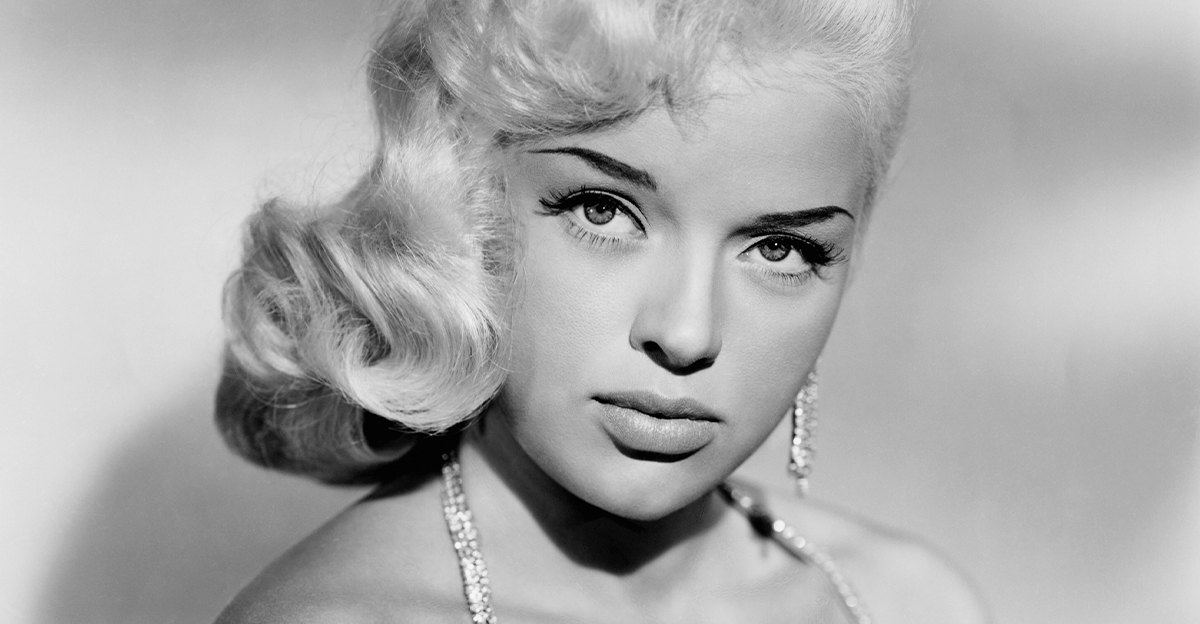 Black and white publicity photo of Diana Dors