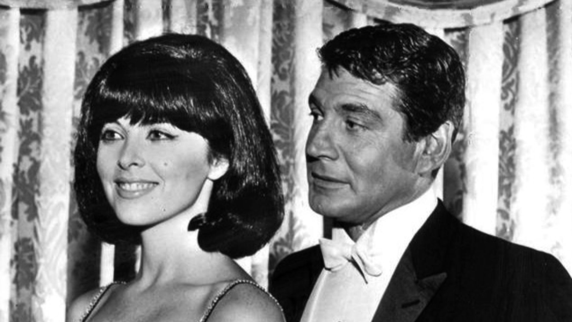 Publicity photo of Tina Louise and Gene Barry from the television program Burke's Law.