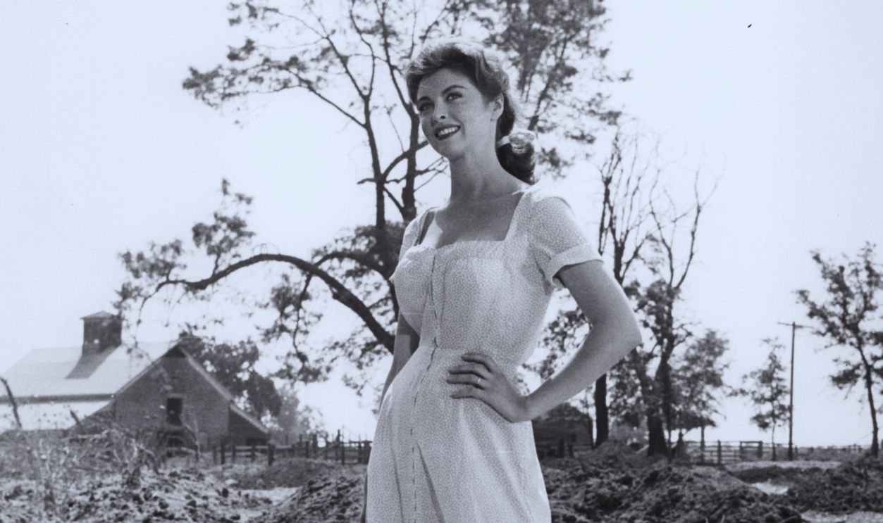 Gettyimages - 122719803, Tina Louise In 'God's Little Acre' Tina Louise standing with hands on hips in a scene from the film 'God's Little Acre', 1958. 