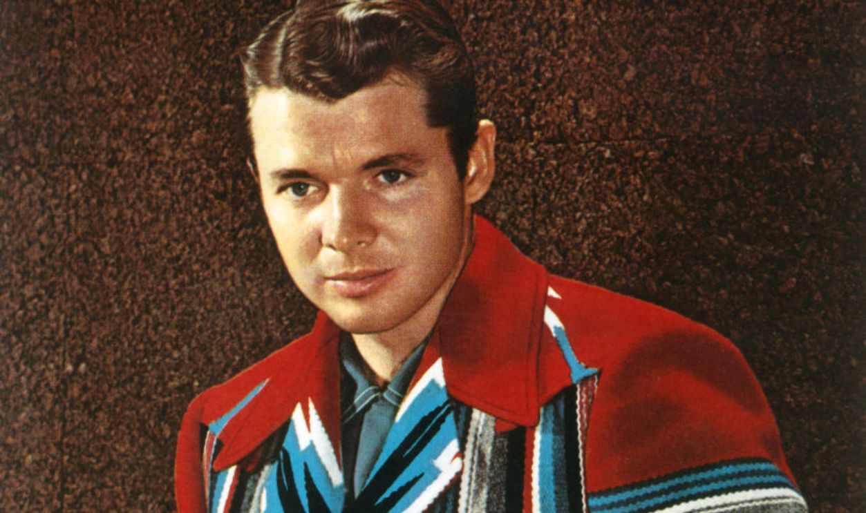 Highly-decorated American soldier and actor Audie Murphy (1925 - 1971) in a colourful jacket, circa 1955. 