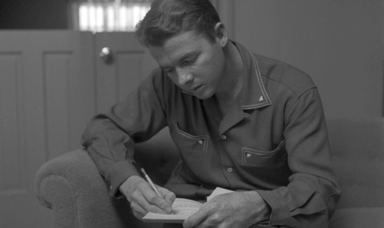 PERRIS,CALIFORNIA - CIRCA 1954: Audie Murphy poses in Perris,CA.