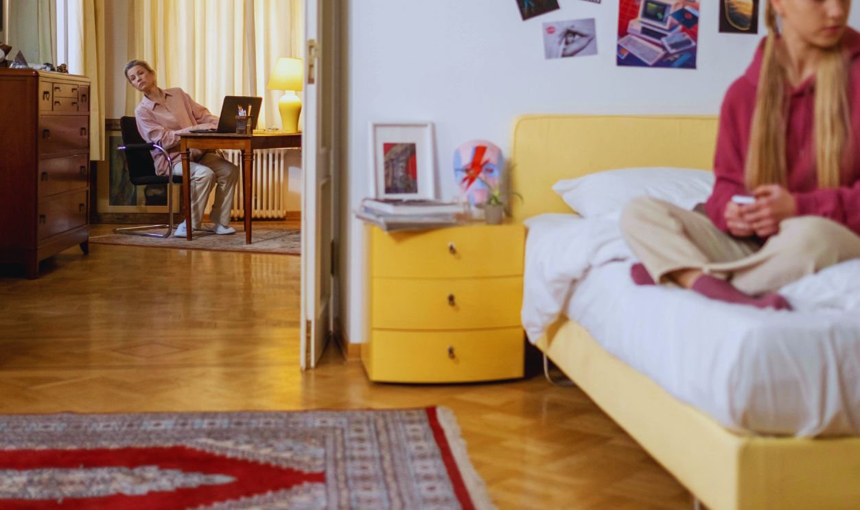 A Woman Looking in at her Daughter's Bedroom