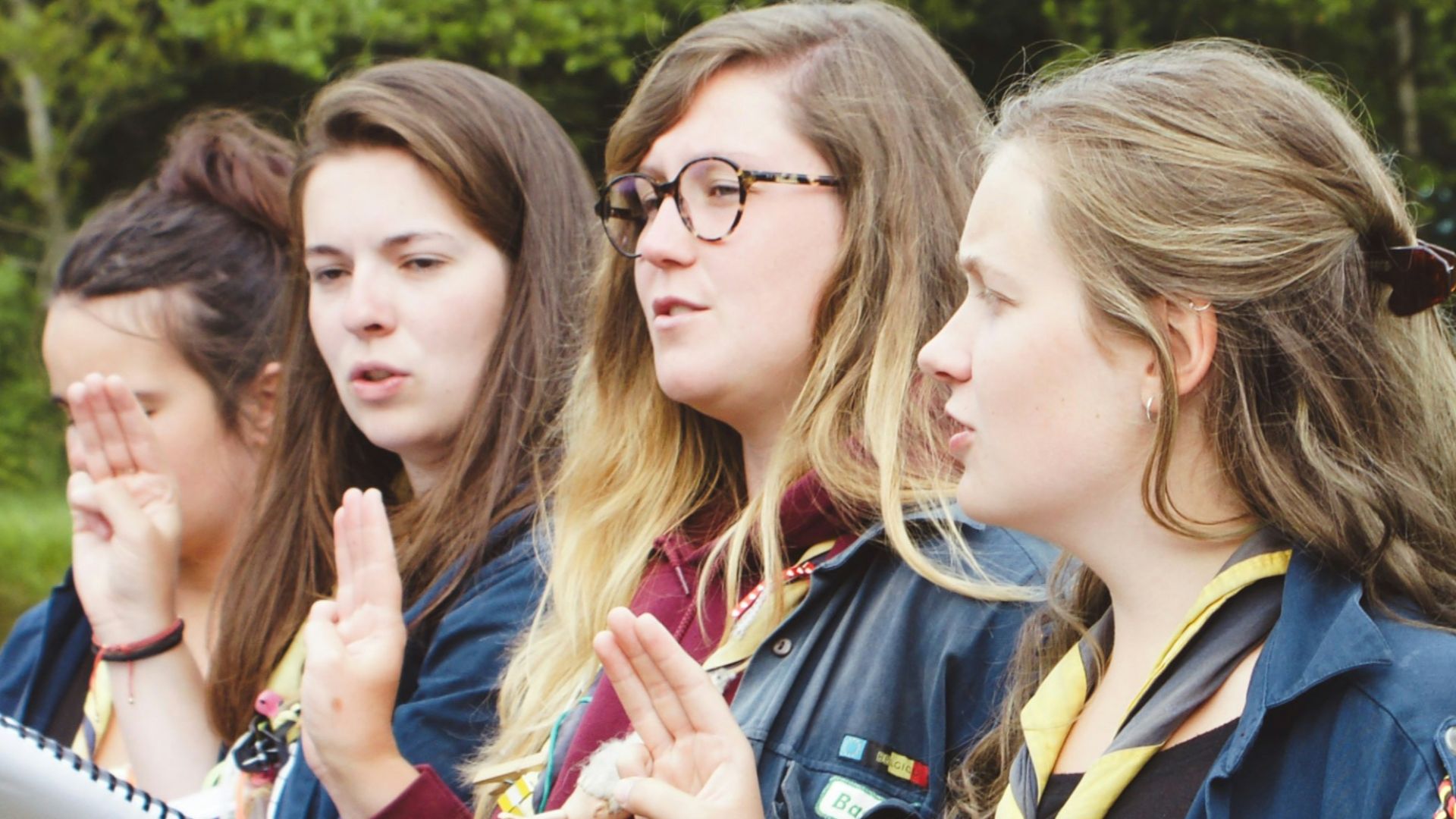 women standing beside each other