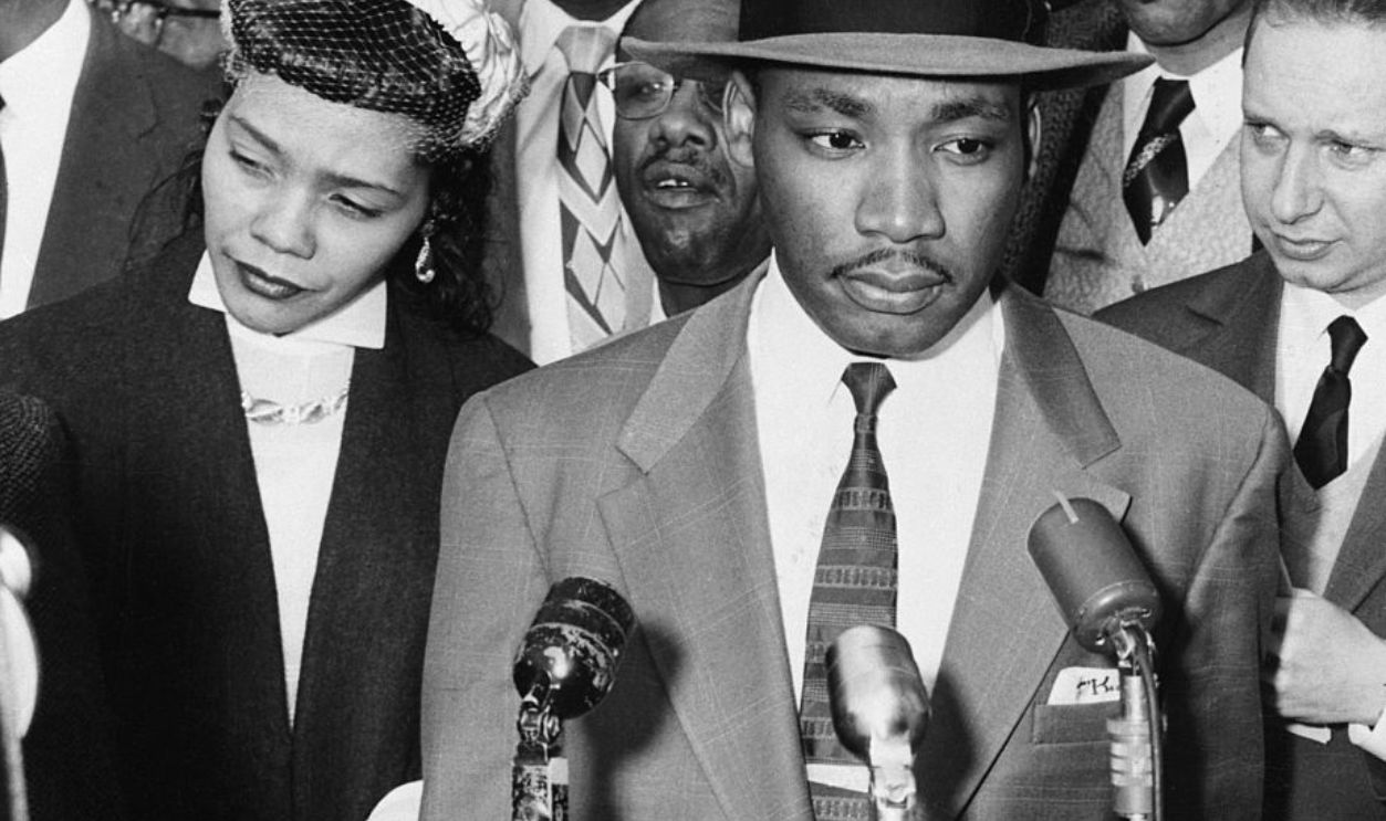Reverend Martin Luther King, Jr., and his wife Coretta Scott King (L), speak to reporters on the steps of the Montgomery County Court House before the opening of his trial. King is the first of the ninety African Americans indicted on boycotting charges involving buses of the Montgomery City Lines, Inc.