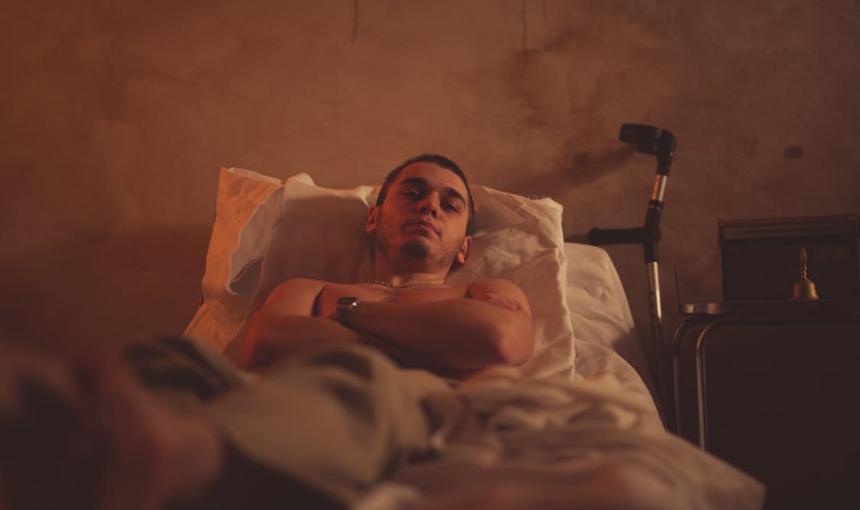 Young Patient Lying in Bed