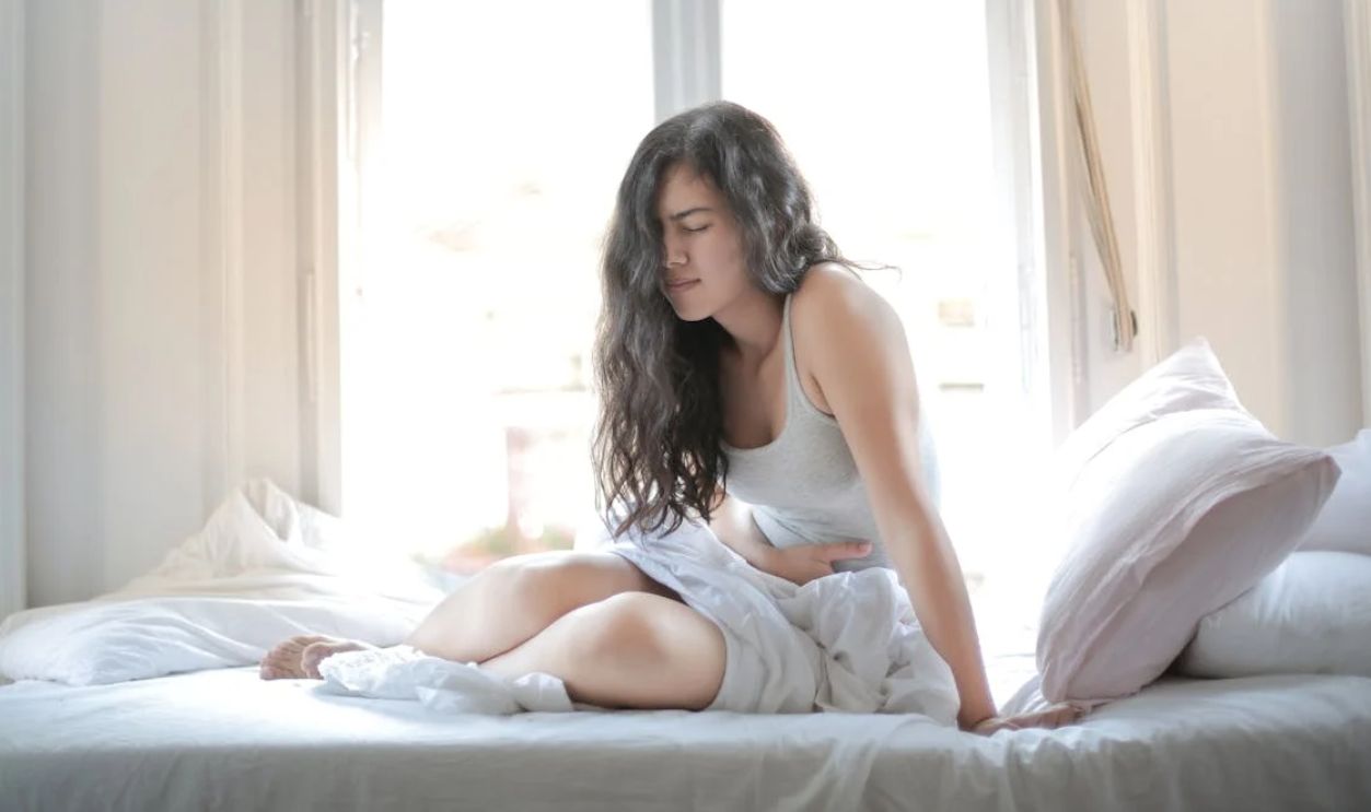 Woman Suffering from a Stomach Pain