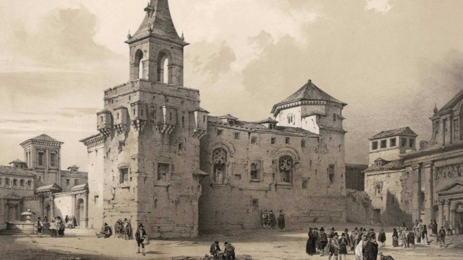 Archbishop's Palace of Alcalá de Henares before 1939 fire. The view is not the main facade but it is taken approximately from the corner of the street of Santiago with Plaza del Palacio, appearing in the foreground the solid Tower of Tenorio, at left the then existing wall of the parade courtyard, replaced years later by the current fence and the Palace area in which was located the courtyard of Covarrubias, that disappeared in the fire of 1939. On the right, partially cut away, it find the facade of the church of las Bernardas.
