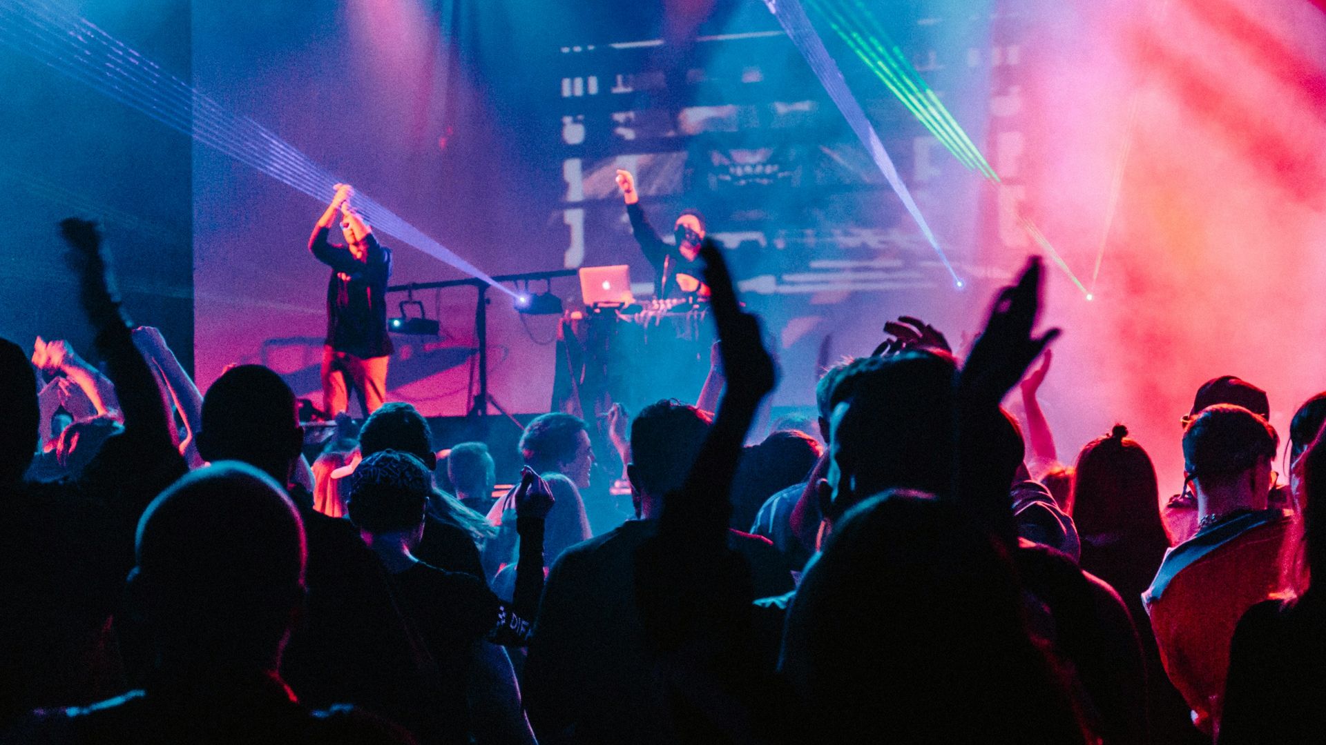 woman singing on stage