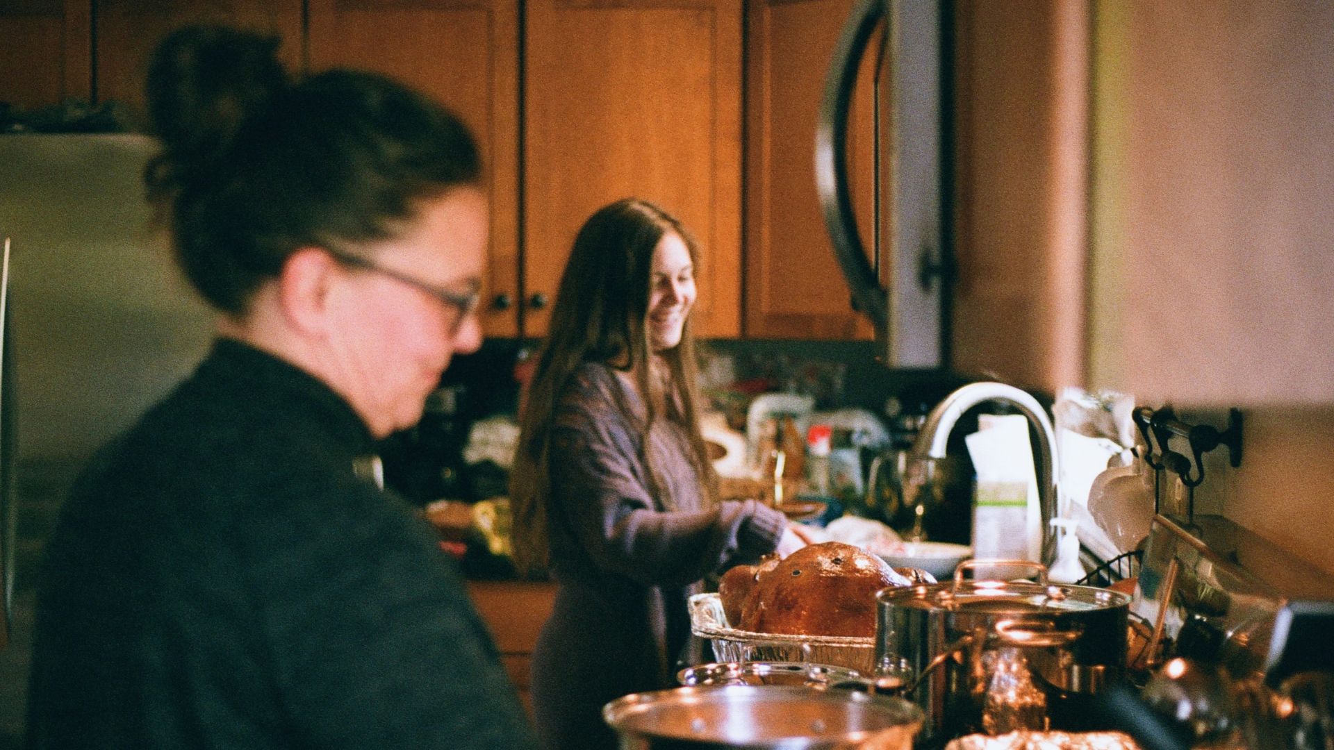 man and woman sitting at table
